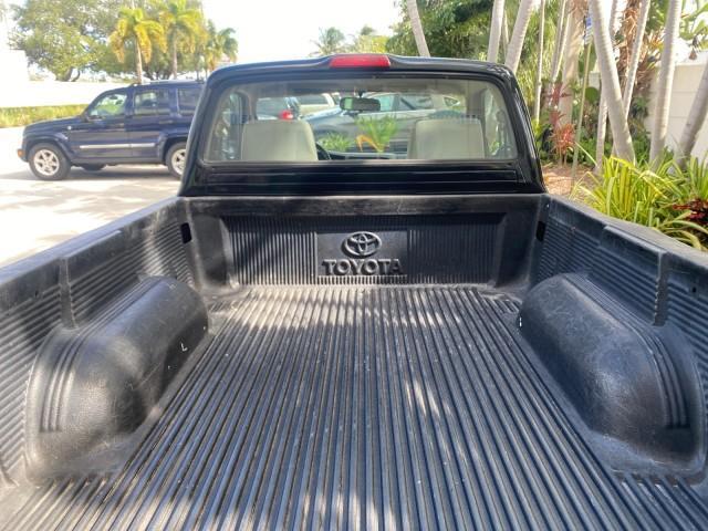 2002 Black Sand Pearl /Charcoal Toyota Tacoma 1 OWNER AUTO AC 4 CYL (5TENL42N02Z) with an 2.4L DOHC EFI 16-Valve I4 Engine engine, Automatic transmission, located at 4701 North Dixie Hwy, Pompano Beach, FL, 33064, (954) 422-2889, 26.240938, -80.123474 - OUR WEBPAGE FLORIDACARS1.COM HAS OVER 100 PHOTOS AND FREE CARFAX LINK 2002 TOYOTA TACOMA VIN: 5TENL42N02Z111289 5 T E N L 4 2 N 0 2 Z 1 1 1 2 8 9 PICKUP 2.4L I4 F DOHC GASOLINE 29 MPG REAR WHEEL DRIVE Features Air Conditioning AM/FM Stereo Automatic Transmission Bed Liner Cassette Player Cloth Seats - Photo#85