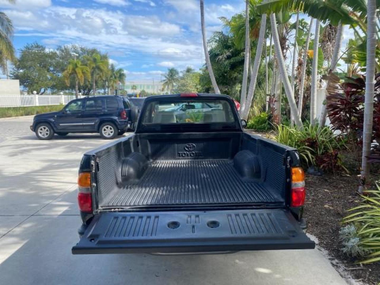 2002 Black Sand Pearl /Charcoal Toyota Tacoma 1 OWNER AUTO AC 4 CYL (5TENL42N02Z) with an 2.4L DOHC EFI 16-Valve I4 Engine engine, Automatic transmission, located at 4701 North Dixie Hwy, Pompano Beach, FL, 33064, (954) 422-2889, 26.240938, -80.123474 - OUR WEBPAGE FLORIDACARS1.COM HAS OVER 100 PHOTOS AND FREE CARFAX LINK 2002 TOYOTA TACOMA VIN: 5TENL42N02Z111289 5 T E N L 4 2 N 0 2 Z 1 1 1 2 8 9 PICKUP 2.4L I4 F DOHC GASOLINE 29 MPG REAR WHEEL DRIVE Features Air Conditioning AM/FM Stereo Automatic Transmission Bed Liner Cassette Player Cloth Seats - Photo#86