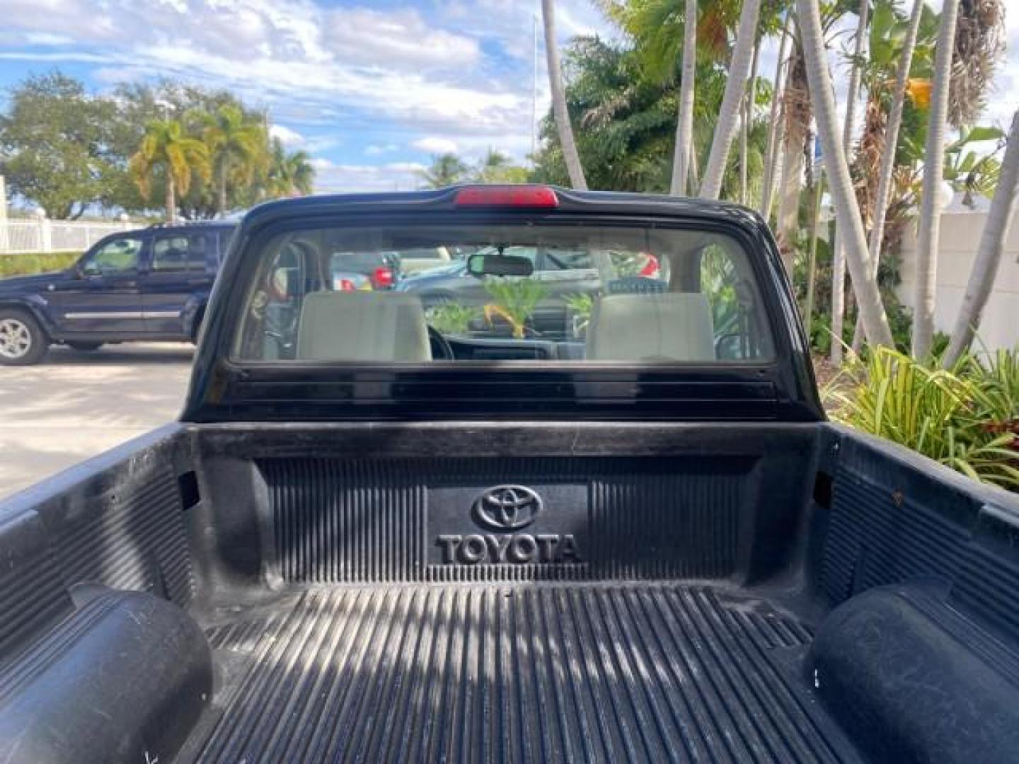 2002 Black Sand Pearl /Charcoal Toyota Tacoma 1 OWNER AUTO AC 4 CYL (5TENL42N02Z) with an 2.4L DOHC EFI 16-Valve I4 Engine engine, Automatic transmission, located at 4701 North Dixie Hwy, Pompano Beach, FL, 33064, (954) 422-2889, 26.240938, -80.123474 - OUR WEBPAGE FLORIDACARS1.COM HAS OVER 100 PHOTOS AND FREE CARFAX LINK 2002 TOYOTA TACOMA VIN: 5TENL42N02Z111289 5 T E N L 4 2 N 0 2 Z 1 1 1 2 8 9 PICKUP 2.4L I4 F DOHC GASOLINE 29 MPG REAR WHEEL DRIVE Features Air Conditioning AM/FM Stereo Automatic Transmission Bed Liner Cassette Player Cloth Seats - Photo#89