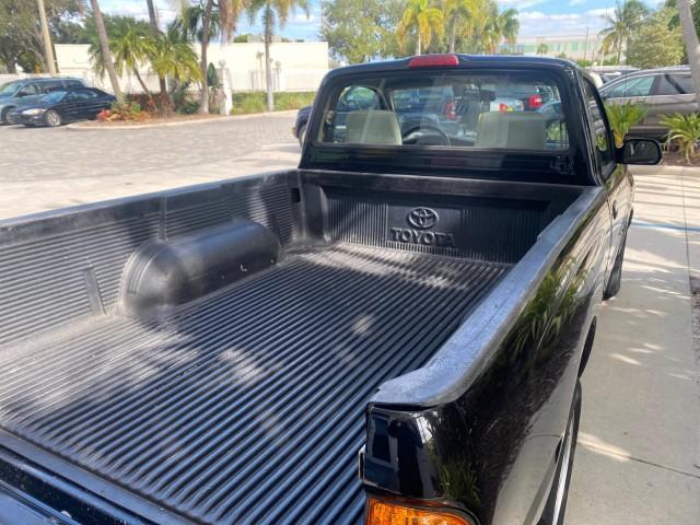 2002 Black Sand Pearl /Charcoal Toyota Tacoma 1 OWNER AUTO AC 4 CYL (5TENL42N02Z) with an 2.4L DOHC EFI 16-Valve I4 Engine engine, Automatic transmission, located at 4701 North Dixie Hwy, Pompano Beach, FL, 33064, (954) 422-2889, 26.240938, -80.123474 - OUR WEBPAGE FLORIDACARS1.COM HAS OVER 100 PHOTOS AND FREE CARFAX LINK 2002 TOYOTA TACOMA VIN: 5TENL42N02Z111289 5 T E N L 4 2 N 0 2 Z 1 1 1 2 8 9 PICKUP 2.4L I4 F DOHC GASOLINE 29 MPG REAR WHEEL DRIVE Features Air Conditioning AM/FM Stereo Automatic Transmission Bed Liner Cassette Player Cloth Seats - Photo#90