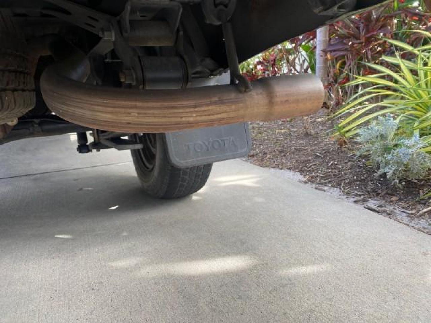 2002 Black Sand Pearl /Charcoal Toyota Tacoma 1 OWNER AUTO AC 4 CYL (5TENL42N02Z) with an 2.4L DOHC EFI 16-Valve I4 Engine engine, Automatic transmission, located at 4701 North Dixie Hwy, Pompano Beach, FL, 33064, (954) 422-2889, 26.240938, -80.123474 - OUR WEBPAGE FLORIDACARS1.COM HAS OVER 100 PHOTOS AND FREE CARFAX LINK 2002 TOYOTA TACOMA VIN: 5TENL42N02Z111289 5 T E N L 4 2 N 0 2 Z 1 1 1 2 8 9 PICKUP 2.4L I4 F DOHC GASOLINE 29 MPG REAR WHEEL DRIVE Features Air Conditioning AM/FM Stereo Automatic Transmission Bed Liner Cassette Player Cloth Seats - Photo#91