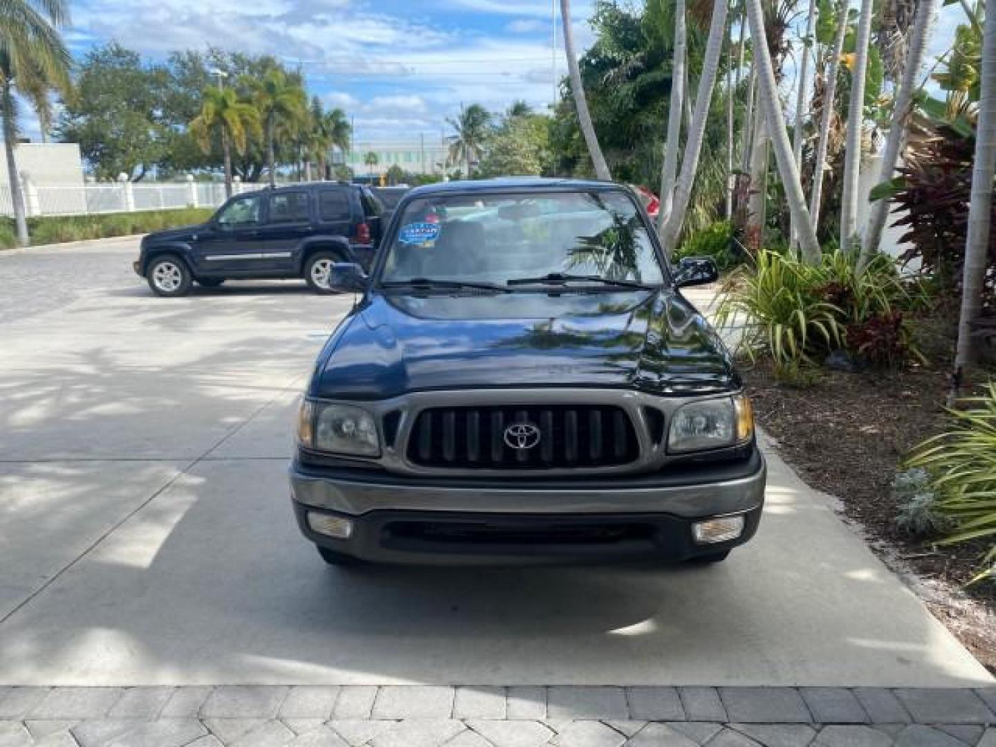 2002 Black Sand Pearl /Charcoal Toyota Tacoma 1 OWNER AUTO AC 4 CYL (5TENL42N02Z) with an 2.4L DOHC EFI 16-Valve I4 Engine engine, Automatic transmission, located at 4701 North Dixie Hwy, Pompano Beach, FL, 33064, (954) 422-2889, 26.240938, -80.123474 - OUR WEBPAGE FLORIDACARS1.COM HAS OVER 100 PHOTOS AND FREE CARFAX LINK 2002 TOYOTA TACOMA VIN: 5TENL42N02Z111289 5 T E N L 4 2 N 0 2 Z 1 1 1 2 8 9 PICKUP 2.4L I4 F DOHC GASOLINE 29 MPG REAR WHEEL DRIVE Features Air Conditioning AM/FM Stereo Automatic Transmission Bed Liner Cassette Player Cloth Seats - Photo#99