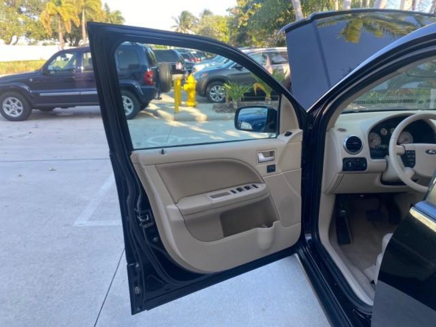 2005 Black /Pebble Ford Freestyle Limited LOW MILES 69,845 1 OWNER AWD (1FMZK06165G) with an 3.0L SMPI 24-Valve V6 Duratec Engine engine, Automatic transmission, located at 4701 North Dixie Hwy, Pompano Beach, FL, 33064, (954) 422-2889, 26.240938, -80.123474 - OUR WEBPAGE FLORIDACARS1.COM HAS OVER 100 PHOTOS AND FREE CARFAX LINK 2005 FORD FREESTYLE LIMITED VIN: 1FMZK06165GA49599 1 F M Z K 0 6 1 6 5 G A 4 9 5 9 9 4 DOOR WAGON/SPORT UTILITY 3.0L V6 F DOHC GASOLINE 24 MPG ALL WHEEL DRIVE Features 4WD/AWD ABS Brakes Air Conditioning Alloy Wheels AM/FM Stereo - Photo#9