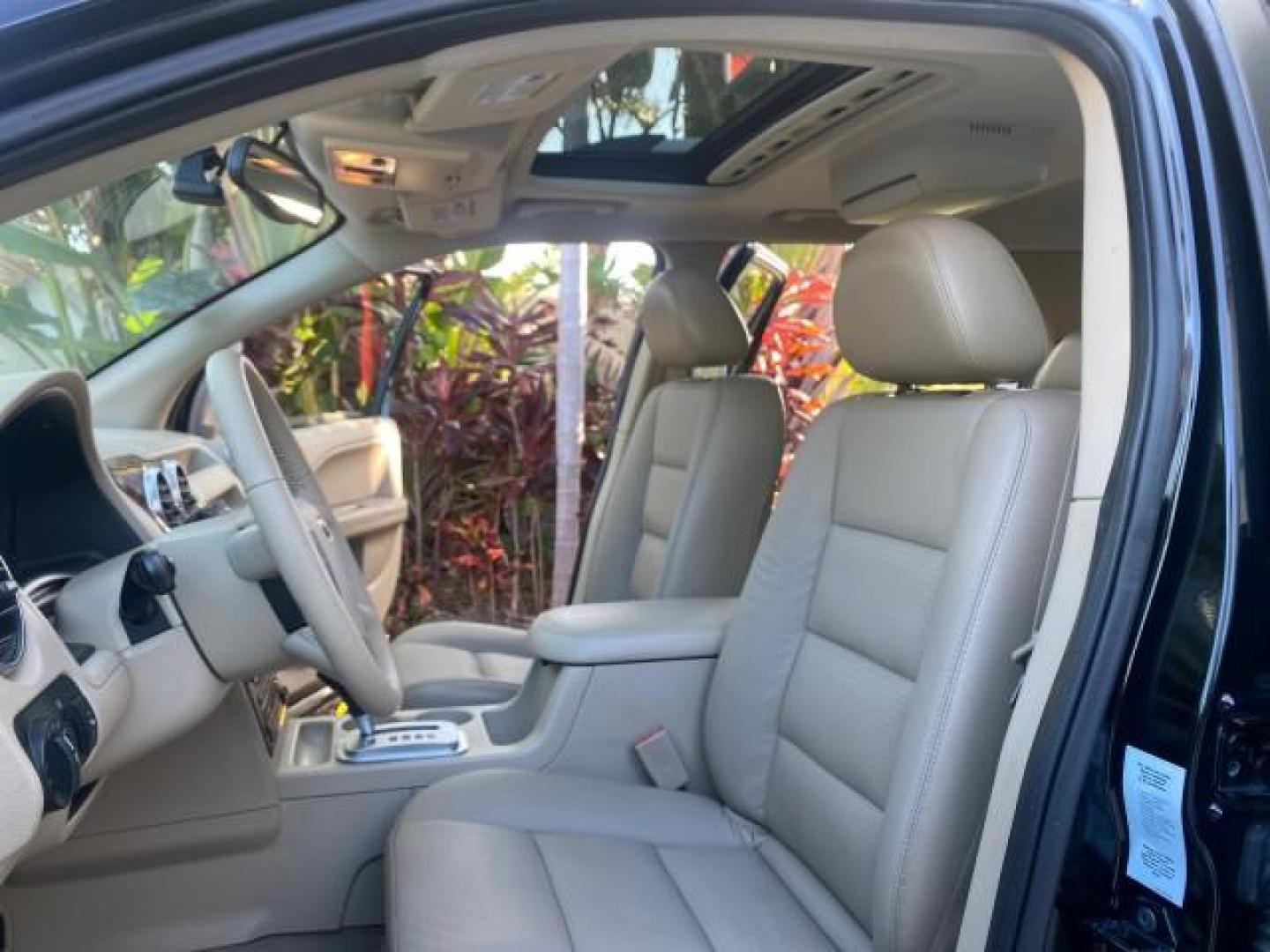 2005 Black /Pebble Ford Freestyle Limited LOW MILES 69,845 1 OWNER AWD (1FMZK06165G) with an 3.0L SMPI 24-Valve V6 Duratec Engine engine, Automatic transmission, located at 4701 North Dixie Hwy, Pompano Beach, FL, 33064, (954) 422-2889, 26.240938, -80.123474 - OUR WEBPAGE FLORIDACARS1.COM HAS OVER 100 PHOTOS AND FREE CARFAX LINK 2005 FORD FREESTYLE LIMITED VIN: 1FMZK06165GA49599 1 F M Z K 0 6 1 6 5 G A 4 9 5 9 9 4 DOOR WAGON/SPORT UTILITY 3.0L V6 F DOHC GASOLINE 24 MPG ALL WHEEL DRIVE Features 4WD/AWD ABS Brakes Air Conditioning Alloy Wheels AM/FM Stereo - Photo#10