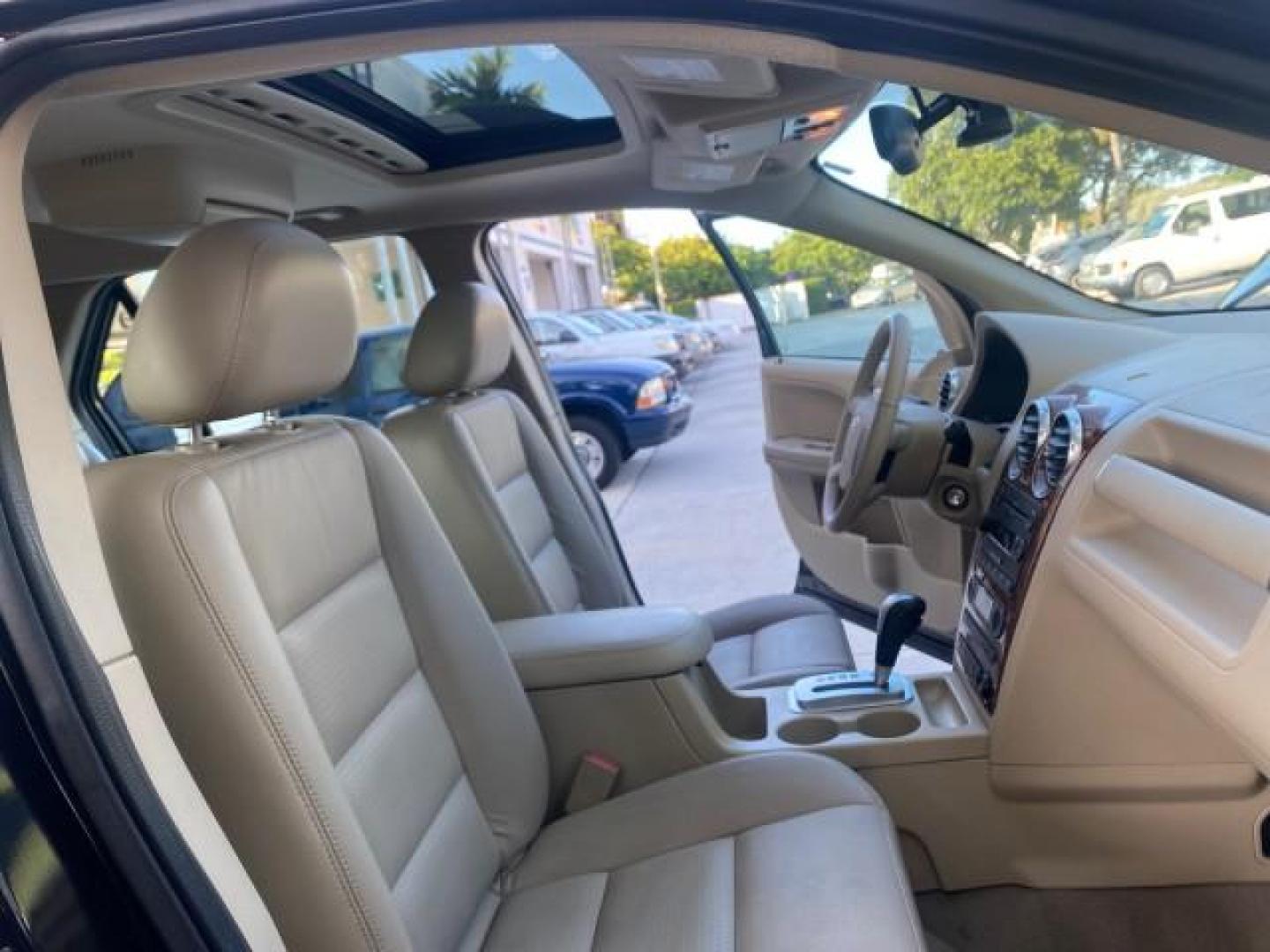 2005 Black /Pebble Ford Freestyle Limited LOW MILES 69,845 1 OWNER AWD (1FMZK06165G) with an 3.0L SMPI 24-Valve V6 Duratec Engine engine, Automatic transmission, located at 4701 North Dixie Hwy, Pompano Beach, FL, 33064, (954) 422-2889, 26.240938, -80.123474 - OUR WEBPAGE FLORIDACARS1.COM HAS OVER 100 PHOTOS AND FREE CARFAX LINK 2005 FORD FREESTYLE LIMITED VIN: 1FMZK06165GA49599 1 F M Z K 0 6 1 6 5 G A 4 9 5 9 9 4 DOOR WAGON/SPORT UTILITY 3.0L V6 F DOHC GASOLINE 24 MPG ALL WHEEL DRIVE Features 4WD/AWD ABS Brakes Air Conditioning Alloy Wheels AM/FM Stereo - Photo#12