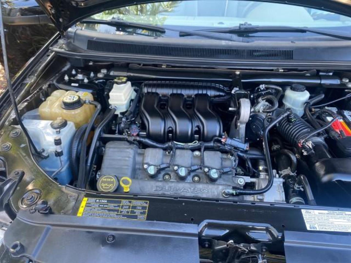 2005 Black /Pebble Ford Freestyle Limited LOW MILES 69,845 1 OWNER AWD (1FMZK06165G) with an 3.0L SMPI 24-Valve V6 Duratec Engine engine, Automatic transmission, located at 4701 North Dixie Hwy, Pompano Beach, FL, 33064, (954) 422-2889, 26.240938, -80.123474 - OUR WEBPAGE FLORIDACARS1.COM HAS OVER 100 PHOTOS AND FREE CARFAX LINK 2005 FORD FREESTYLE LIMITED VIN: 1FMZK06165GA49599 1 F M Z K 0 6 1 6 5 G A 4 9 5 9 9 4 DOOR WAGON/SPORT UTILITY 3.0L V6 F DOHC GASOLINE 24 MPG ALL WHEEL DRIVE Features 4WD/AWD ABS Brakes Air Conditioning Alloy Wheels AM/FM Stereo - Photo#25