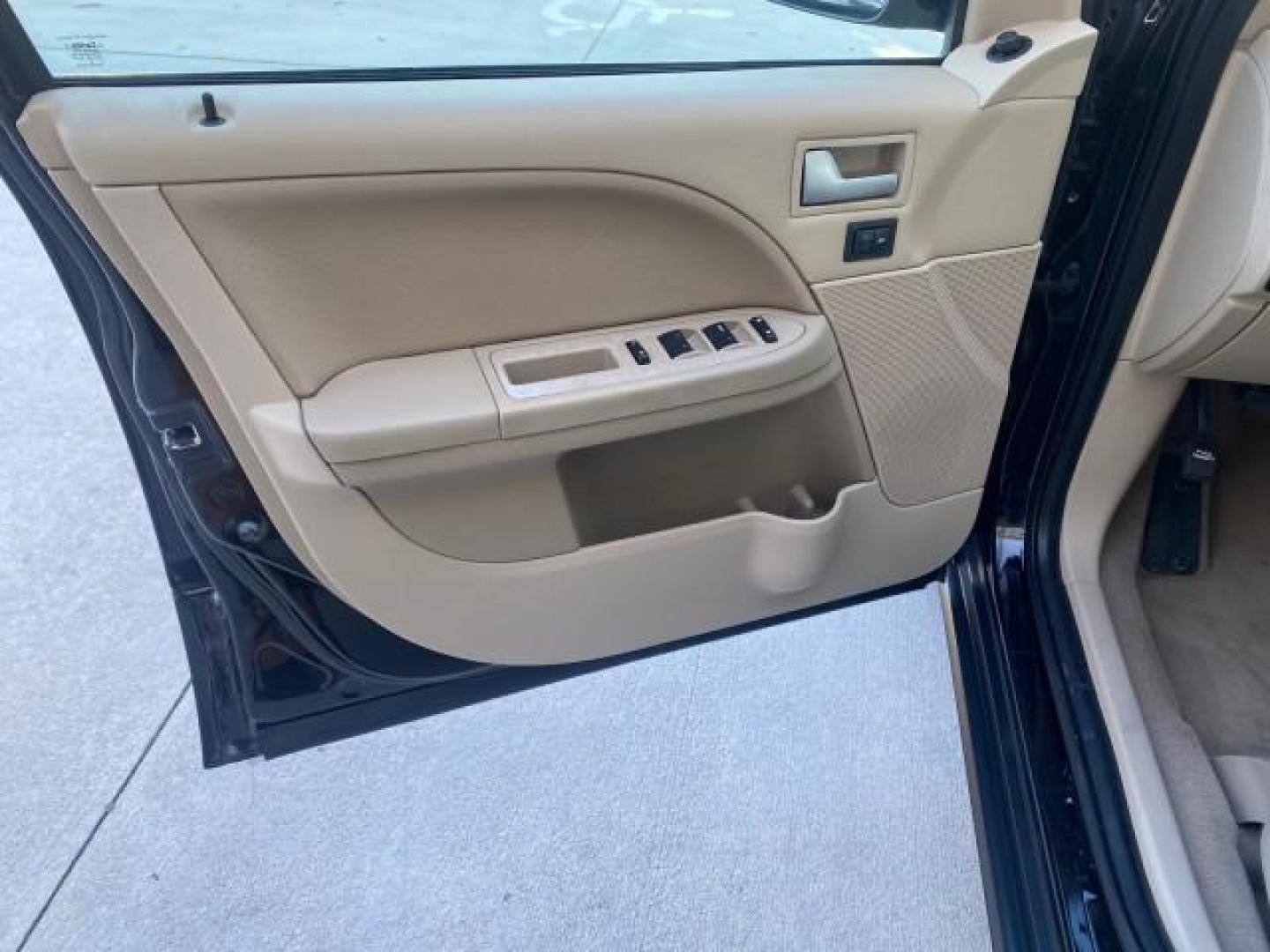 2005 Black /Pebble Ford Freestyle Limited LOW MILES 69,845 1 OWNER AWD (1FMZK06165G) with an 3.0L SMPI 24-Valve V6 Duratec Engine engine, Automatic transmission, located at 4701 North Dixie Hwy, Pompano Beach, FL, 33064, (954) 422-2889, 26.240938, -80.123474 - OUR WEBPAGE FLORIDACARS1.COM HAS OVER 100 PHOTOS AND FREE CARFAX LINK 2005 FORD FREESTYLE LIMITED VIN: 1FMZK06165GA49599 1 F M Z K 0 6 1 6 5 G A 4 9 5 9 9 4 DOOR WAGON/SPORT UTILITY 3.0L V6 F DOHC GASOLINE 24 MPG ALL WHEEL DRIVE Features 4WD/AWD ABS Brakes Air Conditioning Alloy Wheels AM/FM Stereo - Photo#42