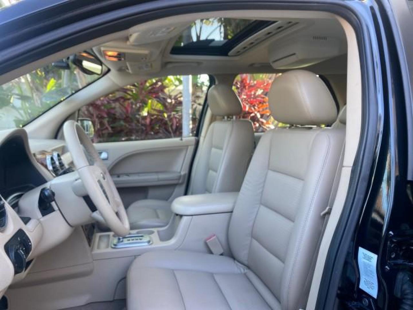 2005 Black /Pebble Ford Freestyle Limited LOW MILES 69,845 1 OWNER AWD (1FMZK06165G) with an 3.0L SMPI 24-Valve V6 Duratec Engine engine, Automatic transmission, located at 4701 North Dixie Hwy, Pompano Beach, FL, 33064, (954) 422-2889, 26.240938, -80.123474 - OUR WEBPAGE FLORIDACARS1.COM HAS OVER 100 PHOTOS AND FREE CARFAX LINK 2005 FORD FREESTYLE LIMITED VIN: 1FMZK06165GA49599 1 F M Z K 0 6 1 6 5 G A 4 9 5 9 9 4 DOOR WAGON/SPORT UTILITY 3.0L V6 F DOHC GASOLINE 24 MPG ALL WHEEL DRIVE Features 4WD/AWD ABS Brakes Air Conditioning Alloy Wheels AM/FM Stereo - Photo#43