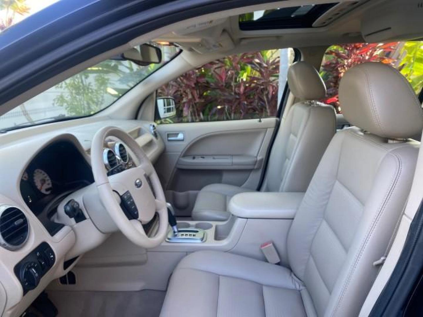 2005 Black /Pebble Ford Freestyle Limited LOW MILES 69,845 1 OWNER AWD (1FMZK06165G) with an 3.0L SMPI 24-Valve V6 Duratec Engine engine, Automatic transmission, located at 4701 North Dixie Hwy, Pompano Beach, FL, 33064, (954) 422-2889, 26.240938, -80.123474 - OUR WEBPAGE FLORIDACARS1.COM HAS OVER 100 PHOTOS AND FREE CARFAX LINK 2005 FORD FREESTYLE LIMITED VIN: 1FMZK06165GA49599 1 F M Z K 0 6 1 6 5 G A 4 9 5 9 9 4 DOOR WAGON/SPORT UTILITY 3.0L V6 F DOHC GASOLINE 24 MPG ALL WHEEL DRIVE Features 4WD/AWD ABS Brakes Air Conditioning Alloy Wheels AM/FM Stereo - Photo#45