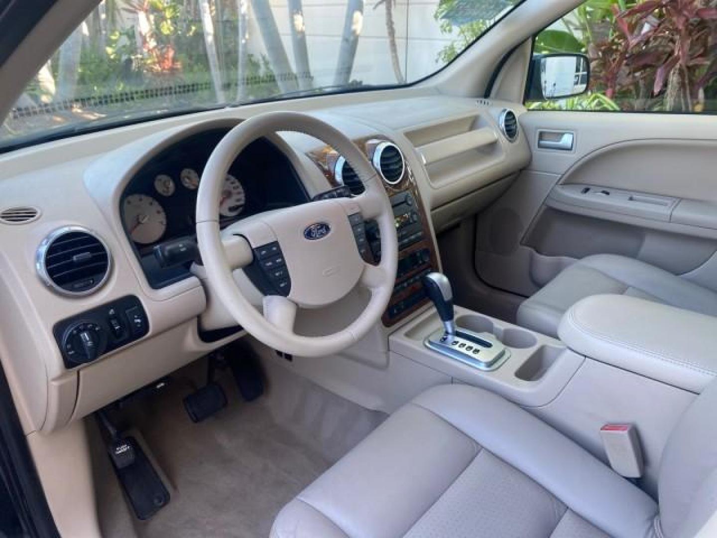 2005 Black /Pebble Ford Freestyle Limited LOW MILES 69,845 1 OWNER AWD (1FMZK06165G) with an 3.0L SMPI 24-Valve V6 Duratec Engine engine, Automatic transmission, located at 4701 North Dixie Hwy, Pompano Beach, FL, 33064, (954) 422-2889, 26.240938, -80.123474 - OUR WEBPAGE FLORIDACARS1.COM HAS OVER 100 PHOTOS AND FREE CARFAX LINK 2005 FORD FREESTYLE LIMITED VIN: 1FMZK06165GA49599 1 F M Z K 0 6 1 6 5 G A 4 9 5 9 9 4 DOOR WAGON/SPORT UTILITY 3.0L V6 F DOHC GASOLINE 24 MPG ALL WHEEL DRIVE Features 4WD/AWD ABS Brakes Air Conditioning Alloy Wheels AM/FM Stereo - Photo#48