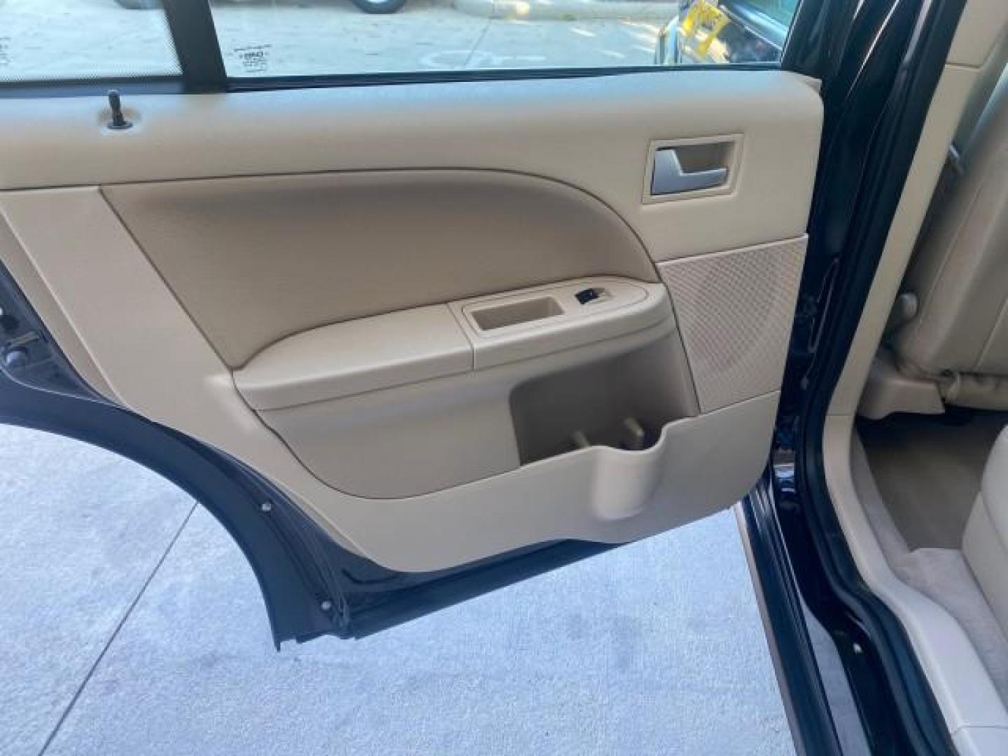 2005 Black /Pebble Ford Freestyle Limited LOW MILES 69,845 1 OWNER AWD (1FMZK06165G) with an 3.0L SMPI 24-Valve V6 Duratec Engine engine, Automatic transmission, located at 4701 North Dixie Hwy, Pompano Beach, FL, 33064, (954) 422-2889, 26.240938, -80.123474 - OUR WEBPAGE FLORIDACARS1.COM HAS OVER 100 PHOTOS AND FREE CARFAX LINK 2005 FORD FREESTYLE LIMITED VIN: 1FMZK06165GA49599 1 F M Z K 0 6 1 6 5 G A 4 9 5 9 9 4 DOOR WAGON/SPORT UTILITY 3.0L V6 F DOHC GASOLINE 24 MPG ALL WHEEL DRIVE Features 4WD/AWD ABS Brakes Air Conditioning Alloy Wheels AM/FM Stereo - Photo#77