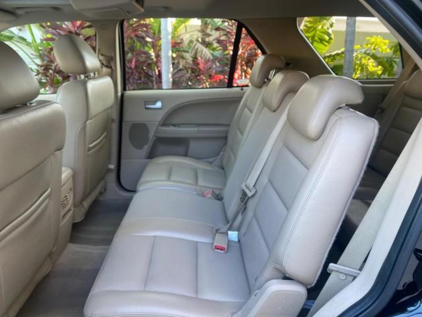 2005 Black /Pebble Ford Freestyle Limited LOW MILES 69,845 1 OWNER AWD (1FMZK06165G) with an 3.0L SMPI 24-Valve V6 Duratec Engine engine, Automatic transmission, located at 4701 North Dixie Hwy, Pompano Beach, FL, 33064, (954) 422-2889, 26.240938, -80.123474 - OUR WEBPAGE FLORIDACARS1.COM HAS OVER 100 PHOTOS AND FREE CARFAX LINK 2005 FORD FREESTYLE LIMITED VIN: 1FMZK06165GA49599 1 F M Z K 0 6 1 6 5 G A 4 9 5 9 9 4 DOOR WAGON/SPORT UTILITY 3.0L V6 F DOHC GASOLINE 24 MPG ALL WHEEL DRIVE Features 4WD/AWD ABS Brakes Air Conditioning Alloy Wheels AM/FM Stereo - Photo#78