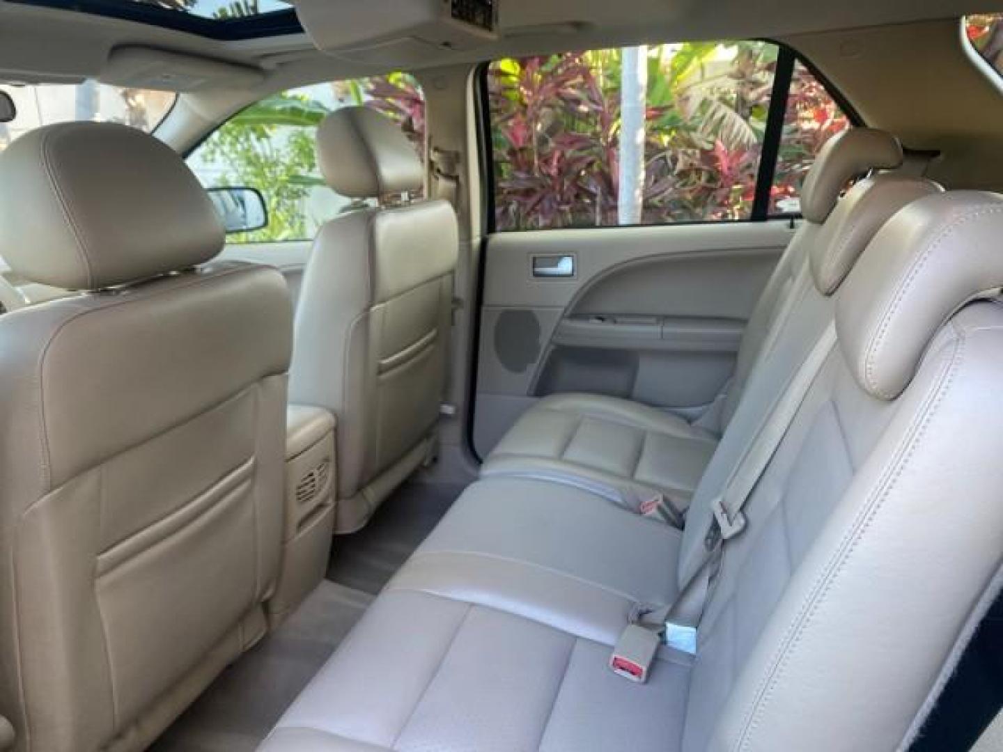 2005 Black /Pebble Ford Freestyle Limited LOW MILES 69,845 1 OWNER AWD (1FMZK06165G) with an 3.0L SMPI 24-Valve V6 Duratec Engine engine, Automatic transmission, located at 4701 North Dixie Hwy, Pompano Beach, FL, 33064, (954) 422-2889, 26.240938, -80.123474 - OUR WEBPAGE FLORIDACARS1.COM HAS OVER 100 PHOTOS AND FREE CARFAX LINK 2005 FORD FREESTYLE LIMITED VIN: 1FMZK06165GA49599 1 F M Z K 0 6 1 6 5 G A 4 9 5 9 9 4 DOOR WAGON/SPORT UTILITY 3.0L V6 F DOHC GASOLINE 24 MPG ALL WHEEL DRIVE Features 4WD/AWD ABS Brakes Air Conditioning Alloy Wheels AM/FM Stereo - Photo#80