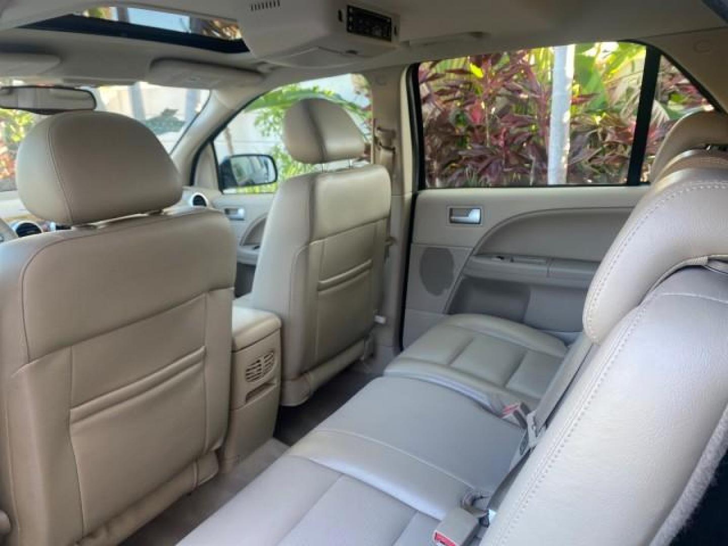 2005 Black /Pebble Ford Freestyle Limited LOW MILES 69,845 1 OWNER AWD (1FMZK06165G) with an 3.0L SMPI 24-Valve V6 Duratec Engine engine, Automatic transmission, located at 4701 North Dixie Hwy, Pompano Beach, FL, 33064, (954) 422-2889, 26.240938, -80.123474 - OUR WEBPAGE FLORIDACARS1.COM HAS OVER 100 PHOTOS AND FREE CARFAX LINK 2005 FORD FREESTYLE LIMITED VIN: 1FMZK06165GA49599 1 F M Z K 0 6 1 6 5 G A 4 9 5 9 9 4 DOOR WAGON/SPORT UTILITY 3.0L V6 F DOHC GASOLINE 24 MPG ALL WHEEL DRIVE Features 4WD/AWD ABS Brakes Air Conditioning Alloy Wheels AM/FM Stereo - Photo#81