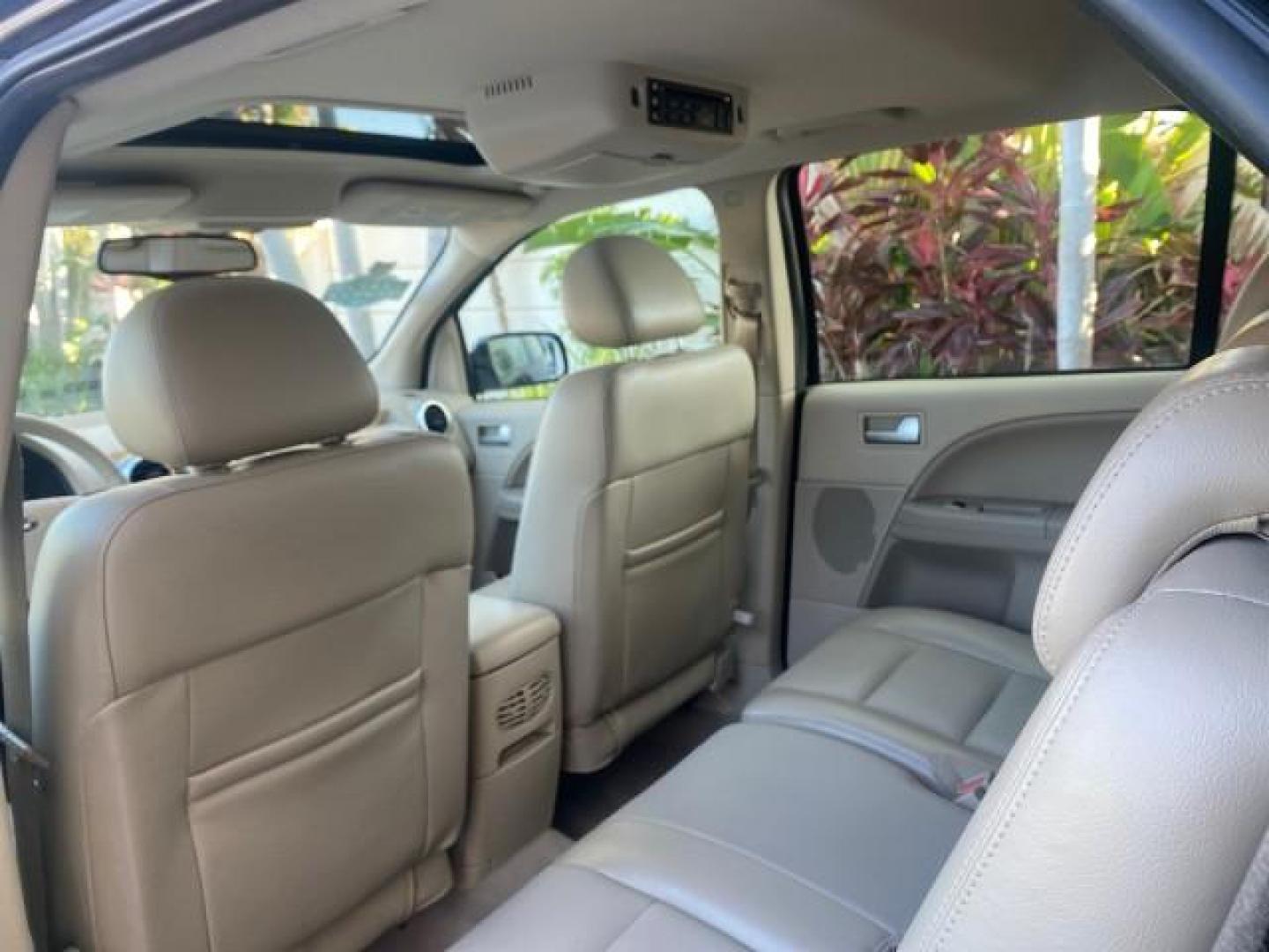 2005 Black /Pebble Ford Freestyle Limited LOW MILES 69,845 1 OWNER AWD (1FMZK06165G) with an 3.0L SMPI 24-Valve V6 Duratec Engine engine, Automatic transmission, located at 4701 North Dixie Hwy, Pompano Beach, FL, 33064, (954) 422-2889, 26.240938, -80.123474 - OUR WEBPAGE FLORIDACARS1.COM HAS OVER 100 PHOTOS AND FREE CARFAX LINK 2005 FORD FREESTYLE LIMITED VIN: 1FMZK06165GA49599 1 F M Z K 0 6 1 6 5 G A 4 9 5 9 9 4 DOOR WAGON/SPORT UTILITY 3.0L V6 F DOHC GASOLINE 24 MPG ALL WHEEL DRIVE Features 4WD/AWD ABS Brakes Air Conditioning Alloy Wheels AM/FM Stereo - Photo#82