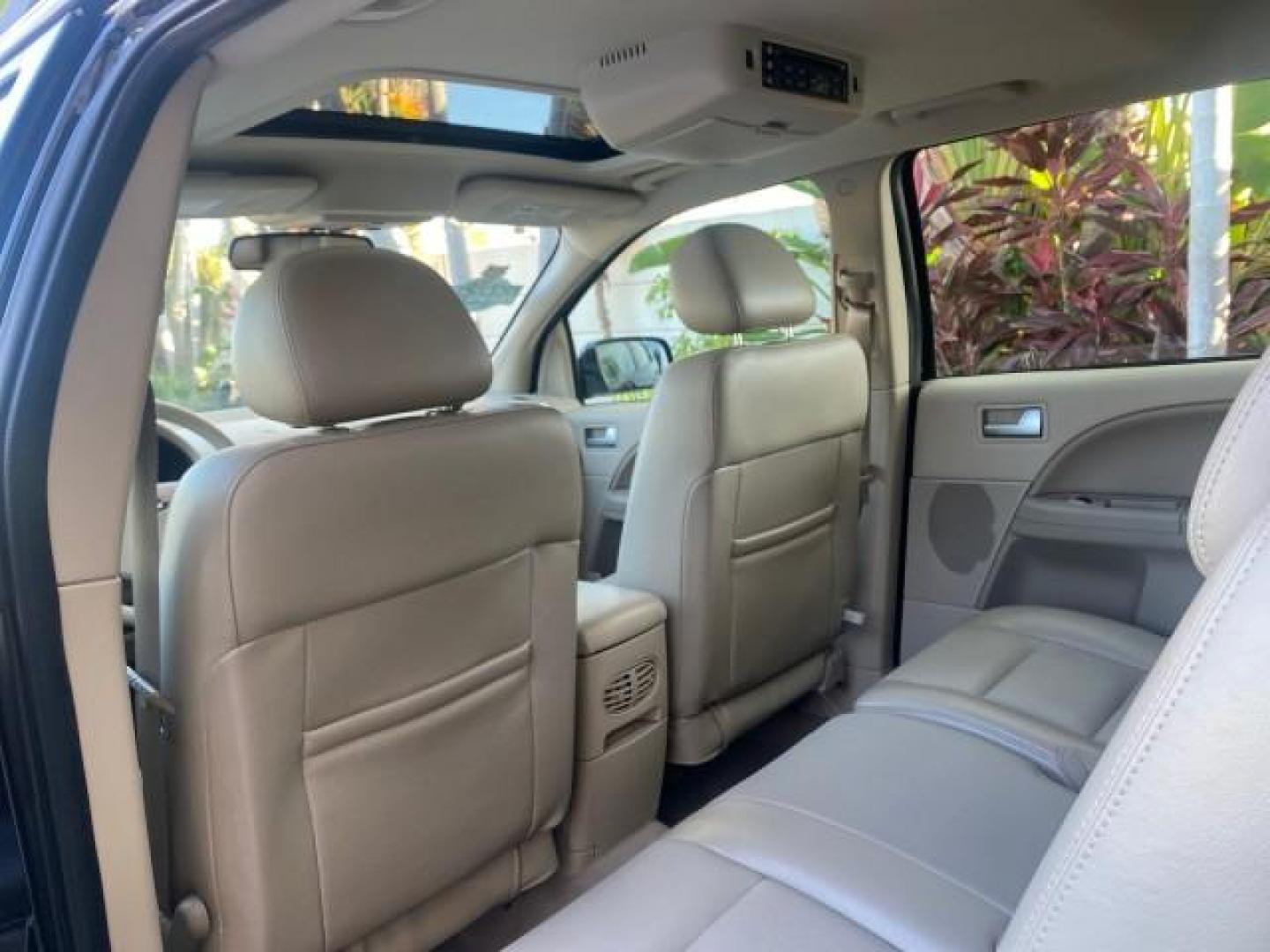 2005 Black /Pebble Ford Freestyle Limited LOW MILES 69,845 1 OWNER AWD (1FMZK06165G) with an 3.0L SMPI 24-Valve V6 Duratec Engine engine, Automatic transmission, located at 4701 North Dixie Hwy, Pompano Beach, FL, 33064, (954) 422-2889, 26.240938, -80.123474 - OUR WEBPAGE FLORIDACARS1.COM HAS OVER 100 PHOTOS AND FREE CARFAX LINK 2005 FORD FREESTYLE LIMITED VIN: 1FMZK06165GA49599 1 F M Z K 0 6 1 6 5 G A 4 9 5 9 9 4 DOOR WAGON/SPORT UTILITY 3.0L V6 F DOHC GASOLINE 24 MPG ALL WHEEL DRIVE Features 4WD/AWD ABS Brakes Air Conditioning Alloy Wheels AM/FM Stereo - Photo#83