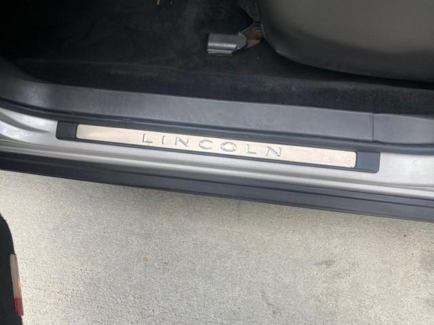 2009 Silver Birch Metallic /Black Lincoln Town Car Signature Limited LOW MILES 50,225 (2LNHM82V49X) with an 4.6L SOHC EFI V8 FFV Engine engine, Automatic transmission, located at 4701 North Dixie Hwy, Pompano Beach, FL, 33064, (954) 422-2889, 26.240938, -80.123474 - OUR WEBPAGE FLORIDACARS1.COM HAS OVER 100 PHOTOS AND FREE CARFAX LINK 2009 LINCOLN TOWN CAR SIGNATURE LIMITED VIN: 2LNHM82V49X626935 2 L N H M 8 2 V 4 9 X 6 2 6 9 3 5 SEDAN 4 DR 4.6L V8 F SOHC 16V FLEX FUEL 24 MPG REAR WHEEL DRIVE Features ABS Brakes Air Conditioning Alloy Wheels AM/FM Stereo Audiop - Photo#43