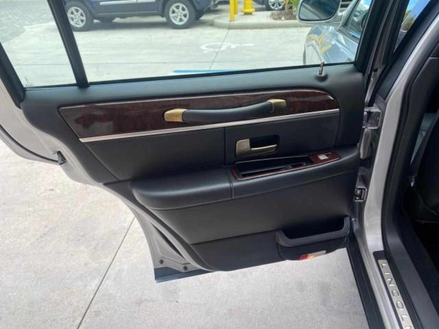 2009 Silver Birch Metallic /Black Lincoln Town Car Signature Limited LOW MILES 50,225 (2LNHM82V49X) with an 4.6L SOHC EFI V8 FFV Engine engine, Automatic transmission, located at 4701 North Dixie Hwy, Pompano Beach, FL, 33064, (954) 422-2889, 26.240938, -80.123474 - OUR WEBPAGE FLORIDACARS1.COM HAS OVER 100 PHOTOS AND FREE CARFAX LINK 2009 LINCOLN TOWN CAR SIGNATURE LIMITED VIN: 2LNHM82V49X626935 2 L N H M 8 2 V 4 9 X 6 2 6 9 3 5 SEDAN 4 DR 4.6L V8 F SOHC 16V FLEX FUEL 24 MPG REAR WHEEL DRIVE Features ABS Brakes Air Conditioning Alloy Wheels AM/FM Stereo Audiop - Photo#76