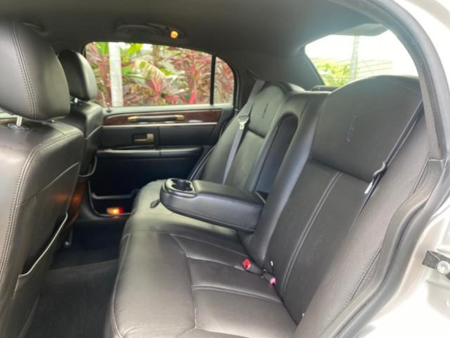 2009 Silver Birch Metallic /Black Lincoln Town Car Signature Limited LOW MILES 50,225 (2LNHM82V49X) with an 4.6L SOHC EFI V8 FFV Engine engine, Automatic transmission, located at 4701 North Dixie Hwy, Pompano Beach, FL, 33064, (954) 422-2889, 26.240938, -80.123474 - OUR WEBPAGE FLORIDACARS1.COM HAS OVER 100 PHOTOS AND FREE CARFAX LINK 2009 LINCOLN TOWN CAR SIGNATURE LIMITED VIN: 2LNHM82V49X626935 2 L N H M 8 2 V 4 9 X 6 2 6 9 3 5 SEDAN 4 DR 4.6L V8 F SOHC 16V FLEX FUEL 24 MPG REAR WHEEL DRIVE Features ABS Brakes Air Conditioning Alloy Wheels AM/FM Stereo Audiop - Photo#78