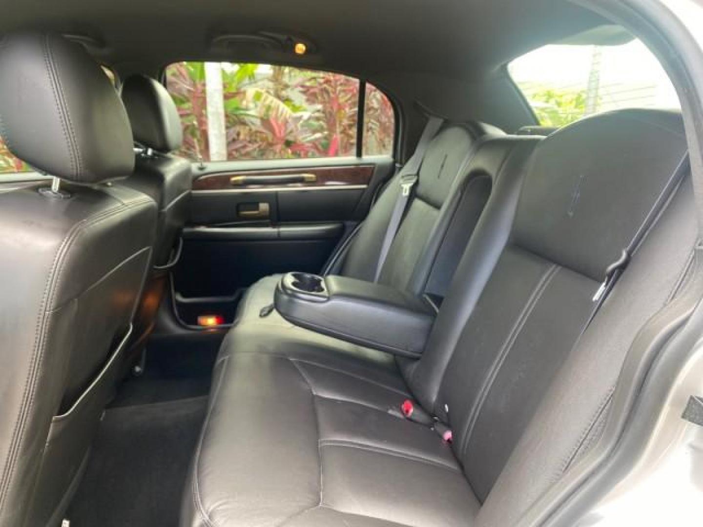 2009 Silver Birch Metallic /Black Lincoln Town Car Signature Limited LOW MILES 50,225 (2LNHM82V49X) with an 4.6L SOHC EFI V8 FFV Engine engine, Automatic transmission, located at 4701 North Dixie Hwy, Pompano Beach, FL, 33064, (954) 422-2889, 26.240938, -80.123474 - OUR WEBPAGE FLORIDACARS1.COM HAS OVER 100 PHOTOS AND FREE CARFAX LINK 2009 LINCOLN TOWN CAR SIGNATURE LIMITED VIN: 2LNHM82V49X626935 2 L N H M 8 2 V 4 9 X 6 2 6 9 3 5 SEDAN 4 DR 4.6L V8 F SOHC 16V FLEX FUEL 24 MPG REAR WHEEL DRIVE Features ABS Brakes Air Conditioning Alloy Wheels AM/FM Stereo Audiop - Photo#79