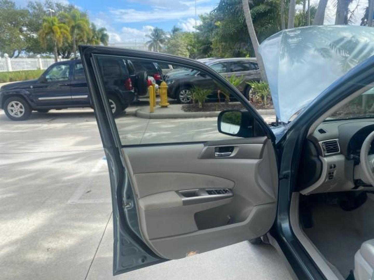 2009 Newport Blue Pearl /Platimum Gray Subaru Forester (Natl) X L.L. Bean Ed LOW MILES 37,791 4WD (JF2SH64619H) with an 2.5L SOHC SMPI 16-Valve 4-Cyl Boxer Engine engine, Automatic transmission, located at 4701 North Dixie Hwy, Pompano Beach, FL, 33064, (954) 422-2889, 26.240938, -80.123474 - OUR WEBPAGE FLORIDACARS1.COM HAS OVER 100 PHOTOS AND FREE CARFAX LINK 2009 SUBARU FORESTER 2.5 X L.L. BEAN LOW MILEAGE FOR THE YEAR VIN: JF2SH64619H778911 J F 2 S H 6 4 6 1 9 H 7 7 8 9 1 1 4 DOOR WAGON/SPORT UTILITY 2.5L H4 F SOHC 16V GASOLINE 26 MPG ALL WHEEL DRIVE Features 4WD/AWD ABS Brakes Air C - Photo#9