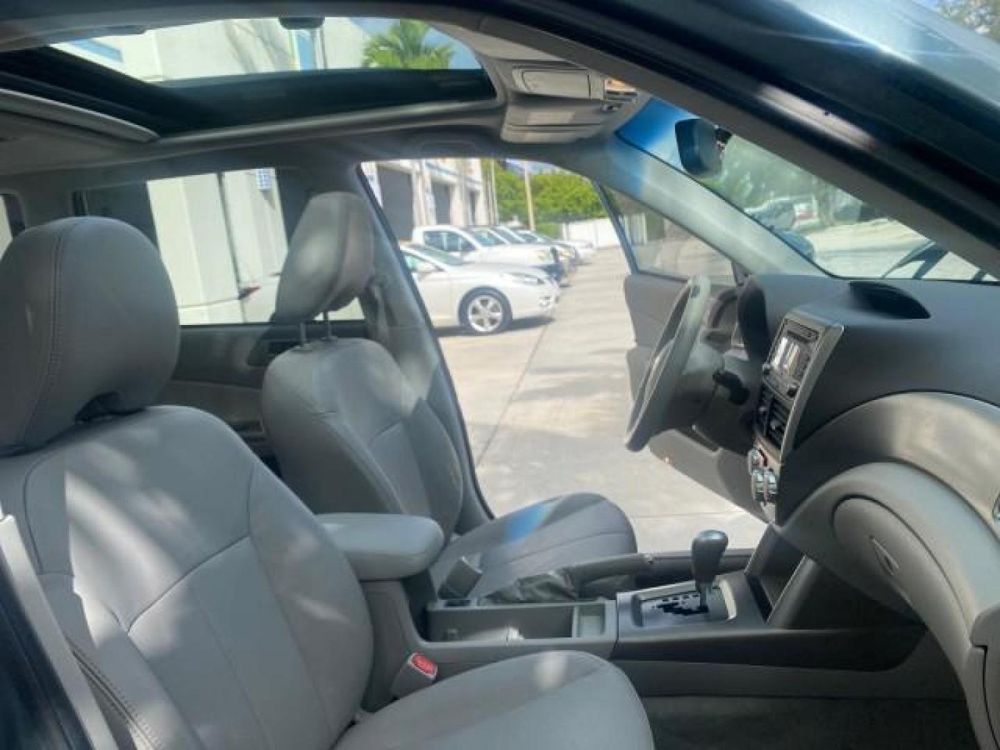 2009 Newport Blue Pearl /Platimum Gray Subaru Forester (Natl) X L.L. Bean Ed LOW MILES 37,791 4WD (JF2SH64619H) with an 2.5L SOHC SMPI 16-Valve 4-Cyl Boxer Engine engine, Automatic transmission, located at 4701 North Dixie Hwy, Pompano Beach, FL, 33064, (954) 422-2889, 26.240938, -80.123474 - OUR WEBPAGE FLORIDACARS1.COM HAS OVER 100 PHOTOS AND FREE CARFAX LINK 2009 SUBARU FORESTER 2.5 X L.L. BEAN LOW MILEAGE FOR THE YEAR VIN: JF2SH64619H778911 J F 2 S H 6 4 6 1 9 H 7 7 8 9 1 1 4 DOOR WAGON/SPORT UTILITY 2.5L H4 F SOHC 16V GASOLINE 26 MPG ALL WHEEL DRIVE Features 4WD/AWD ABS Brakes Air C - Photo#12