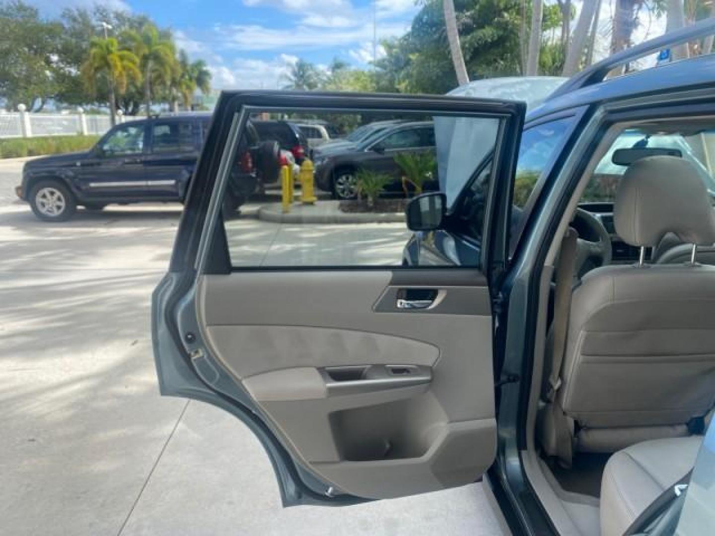 2009 Newport Blue Pearl /Platimum Gray Subaru Forester (Natl) X L.L. Bean Ed LOW MILES 37,791 4WD (JF2SH64619H) with an 2.5L SOHC SMPI 16-Valve 4-Cyl Boxer Engine engine, Automatic transmission, located at 4701 North Dixie Hwy, Pompano Beach, FL, 33064, (954) 422-2889, 26.240938, -80.123474 - OUR WEBPAGE FLORIDACARS1.COM HAS OVER 100 PHOTOS AND FREE CARFAX LINK 2009 SUBARU FORESTER 2.5 X L.L. BEAN LOW MILEAGE FOR THE YEAR VIN: JF2SH64619H778911 J F 2 S H 6 4 6 1 9 H 7 7 8 9 1 1 4 DOOR WAGON/SPORT UTILITY 2.5L H4 F SOHC 16V GASOLINE 26 MPG ALL WHEEL DRIVE Features 4WD/AWD ABS Brakes Air C - Photo#13