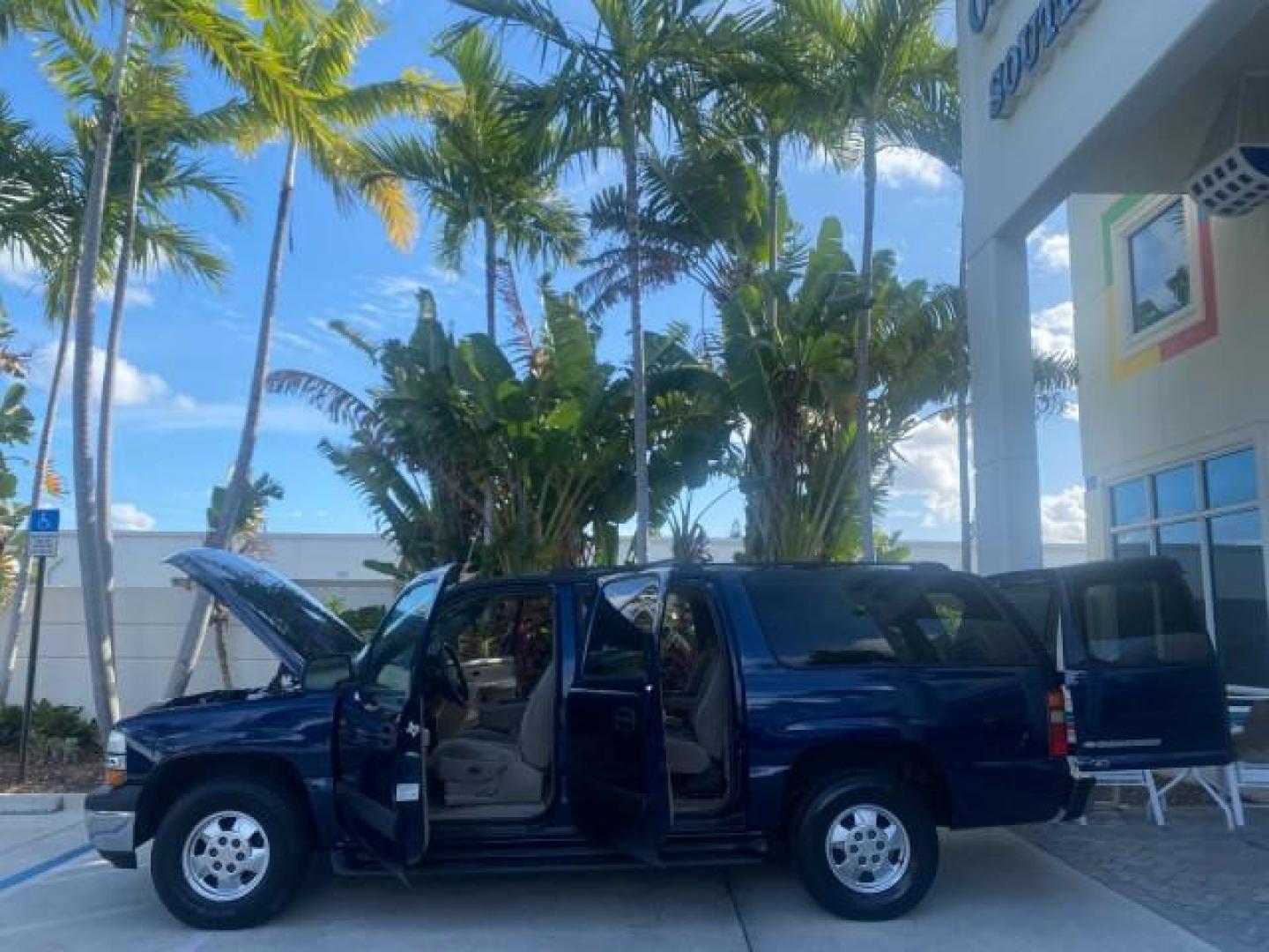 2001 Indigo Blue Metallic /Tan/Neutral Chevrolet Suburban LT 1 OWNER 44 SERVICES NO ACCIDENTS (3GNFK16T41G) with an 5.3L Vortec 1000 SFI V8 Engine engine, Automatic transmission, located at 4701 North Dixie Hwy, Pompano Beach, FL, 33064, (954) 422-2889, 26.240938, -80.123474 - OUR WEBPAGE FLORIDACARS1.COM HAS OVER 100 PHOTOS AND FREE CARFAX LINK 2001 CHEVROLET SUBURBAN 1500 4 WHEEL DRIVE CLOTH LOADED - LIKE NEW VIN: 3GNFK16T41G205451 3 G N F K 1 6 T 4 1 G 2 0 5 4 5 1 4 DOOR WAGON/SPORT UTILITY 5.3L V8 F OHV GASOLINE 18 MPG REAR WHEEL DRIVE W/ 4X4 Features ABS Brakes Air C - Photo#8