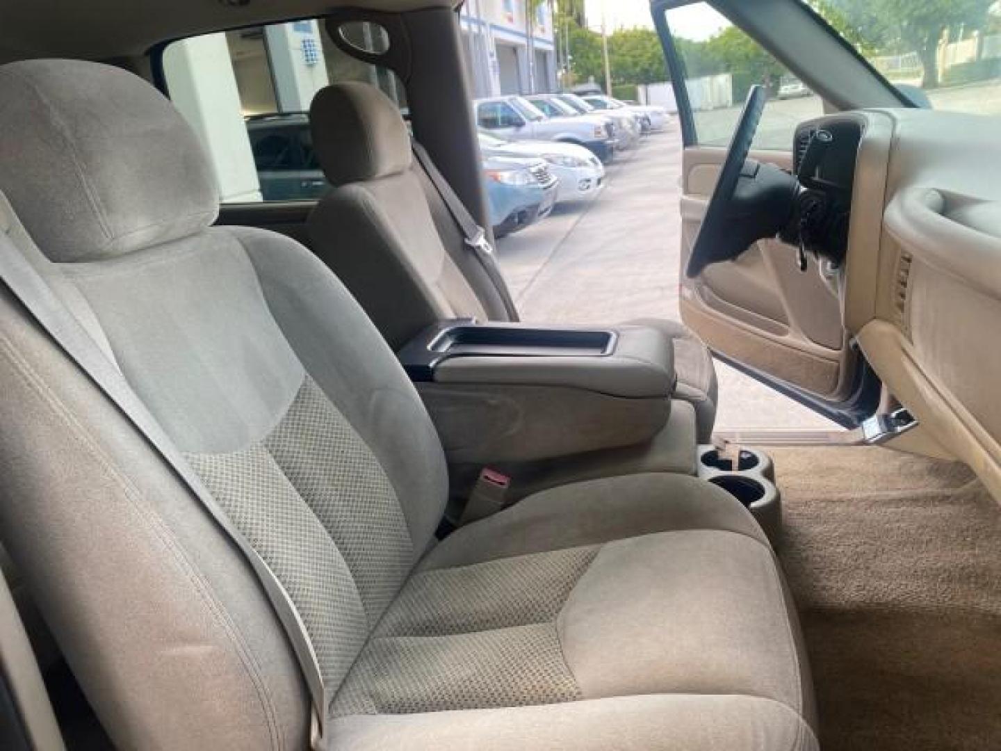 2001 Indigo Blue Metallic /Tan/Neutral Chevrolet Suburban LT 1 OWNER 44 SERVICES NO ACCIDENTS (3GNFK16T41G) with an 5.3L Vortec 1000 SFI V8 Engine engine, Automatic transmission, located at 4701 North Dixie Hwy, Pompano Beach, FL, 33064, (954) 422-2889, 26.240938, -80.123474 - OUR WEBPAGE FLORIDACARS1.COM HAS OVER 100 PHOTOS AND FREE CARFAX LINK 2001 CHEVROLET SUBURBAN 1500 4 WHEEL DRIVE CLOTH LOADED - LIKE NEW VIN: 3GNFK16T41G205451 3 G N F K 1 6 T 4 1 G 2 0 5 4 5 1 4 DOOR WAGON/SPORT UTILITY 5.3L V8 F OHV GASOLINE 18 MPG REAR WHEEL DRIVE W/ 4X4 Features ABS Brakes Air C - Photo#12