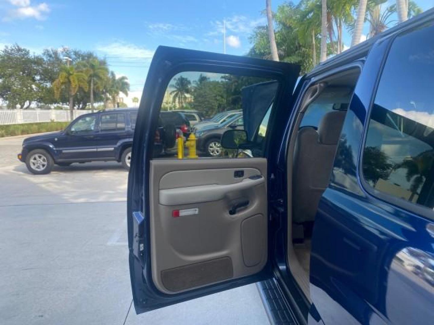 2001 Indigo Blue Metallic /Tan/Neutral Chevrolet Suburban LT 1 OWNER 44 SERVICES NO ACCIDENTS (3GNFK16T41G) with an 5.3L Vortec 1000 SFI V8 Engine engine, Automatic transmission, located at 4701 North Dixie Hwy, Pompano Beach, FL, 33064, (954) 422-2889, 26.240938, -80.123474 - OUR WEBPAGE FLORIDACARS1.COM HAS OVER 100 PHOTOS AND FREE CARFAX LINK 2001 CHEVROLET SUBURBAN 1500 4 WHEEL DRIVE CLOTH LOADED - LIKE NEW VIN: 3GNFK16T41G205451 3 G N F K 1 6 T 4 1 G 2 0 5 4 5 1 4 DOOR WAGON/SPORT UTILITY 5.3L V8 F OHV GASOLINE 18 MPG REAR WHEEL DRIVE W/ 4X4 Features ABS Brakes Air C - Photo#13