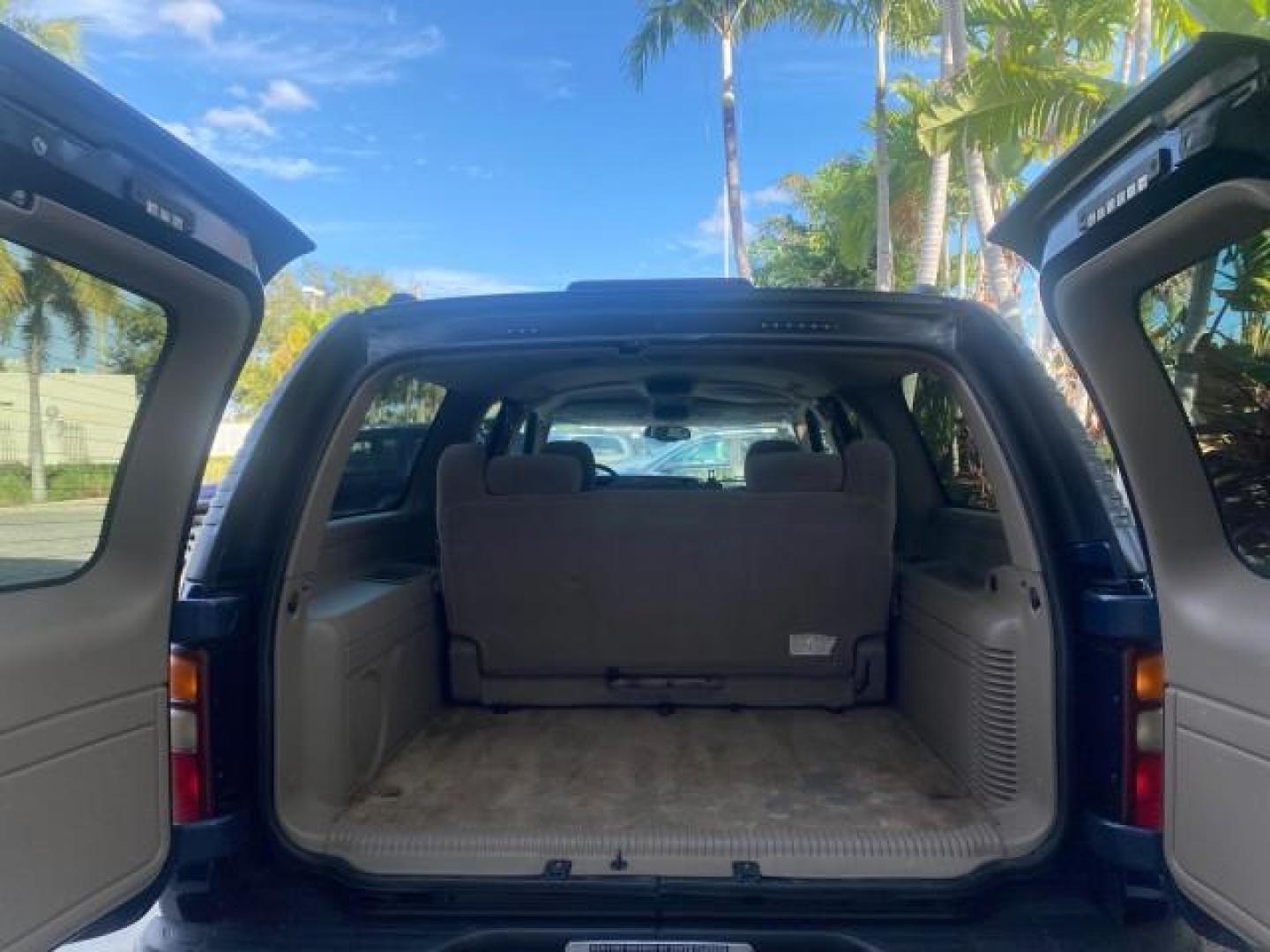 2001 Indigo Blue Metallic /Tan/Neutral Chevrolet Suburban LT 1 OWNER 44 SERVICES NO ACCIDENTS (3GNFK16T41G) with an 5.3L Vortec 1000 SFI V8 Engine engine, Automatic transmission, located at 4701 North Dixie Hwy, Pompano Beach, FL, 33064, (954) 422-2889, 26.240938, -80.123474 - OUR WEBPAGE FLORIDACARS1.COM HAS OVER 100 PHOTOS AND FREE CARFAX LINK 2001 CHEVROLET SUBURBAN 1500 4 WHEEL DRIVE CLOTH LOADED - LIKE NEW VIN: 3GNFK16T41G205451 3 G N F K 1 6 T 4 1 G 2 0 5 4 5 1 4 DOOR WAGON/SPORT UTILITY 5.3L V8 F OHV GASOLINE 18 MPG REAR WHEEL DRIVE W/ 4X4 Features ABS Brakes Air C - Photo#90