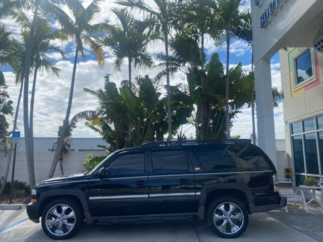 2001 Onyx Black /Graphite/Med Gray Chevrolet Suburban LT Z71 1 FL 4WD 44 SERVICES NO ACCIDENTS (3GNFK16T41G) with an 5.3L Vortec 1000 SFI V8 Engine engine, Automatic transmission, located at 4701 North Dixie Hwy, Pompano Beach, FL, 33064, (954) 422-2889, 26.240938, -80.123474 - OUR WEBPAGE FLORIDACARS1.COM HAS OVER 100 PHOTOS AND FREE CARFAX LINK 2001 CHEVROLET SUBURBAN 1500 Z71 4 WHEEL DRIVE LEATHER LOADED SUNROOF IMMACULATE VIN: 3GNFK16T41G205451 3 G N F K 1 6 T 4 1 G 2 0 5 4 5 1 4 DOOR WAGON/SPORT UTILITY 5.3L V8 F OHV GASOLINE 18 MPG REAR WHEEL DRIVE W/ 4X4 Features 4W - Photo#4