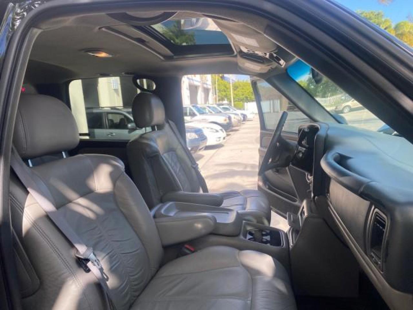 2001 Onyx Black /Graphite/Med Gray Chevrolet Suburban LT Z71 1 FL 4WD 44 SERVICES NO ACCIDENTS (3GNFK16T41G) with an 5.3L Vortec 1000 SFI V8 Engine engine, Automatic transmission, located at 4701 North Dixie Hwy, Pompano Beach, FL, 33064, (954) 422-2889, 26.240938, -80.123474 - OUR WEBPAGE FLORIDACARS1.COM HAS OVER 100 PHOTOS AND FREE CARFAX LINK 2001 CHEVROLET SUBURBAN 1500 Z71 4 WHEEL DRIVE LEATHER LOADED SUNROOF IMMACULATE VIN: 3GNFK16T41G205451 3 G N F K 1 6 T 4 1 G 2 0 5 4 5 1 4 DOOR WAGON/SPORT UTILITY 5.3L V8 F OHV GASOLINE 18 MPG REAR WHEEL DRIVE W/ 4X4 Features 4W - Photo#12