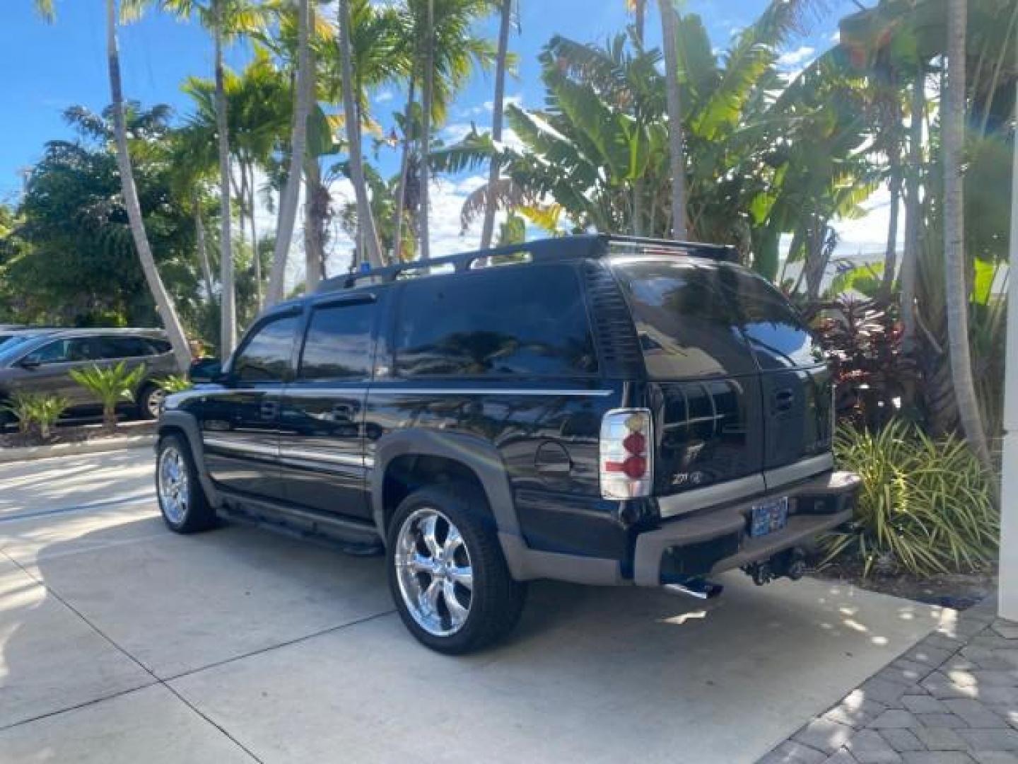 2001 Onyx Black /Graphite/Med Gray Chevrolet Suburban LT Z71 1 FL 4WD 44 SERVICES NO ACCIDENTS (3GNFK16T41G) with an 5.3L Vortec 1000 SFI V8 Engine engine, Automatic transmission, located at 4701 North Dixie Hwy, Pompano Beach, FL, 33064, (954) 422-2889, 26.240938, -80.123474 - OUR WEBPAGE FLORIDACARS1.COM HAS OVER 100 PHOTOS AND FREE CARFAX LINK 2001 CHEVROLET SUBURBAN 1500 Z71 4 WHEEL DRIVE LEATHER LOADED SUNROOF IMMACULATE VIN: 3GNFK16T41G205451 3 G N F K 1 6 T 4 1 G 2 0 5 4 5 1 4 DOOR WAGON/SPORT UTILITY 5.3L V8 F OHV GASOLINE 18 MPG REAR WHEEL DRIVE W/ 4X4 Features 4W - Photo#33