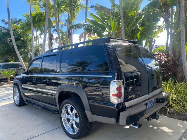 2001 Onyx Black /Graphite/Med Gray Chevrolet Suburban LT Z71 1 FL 4WD 44 SERVICES NO ACCIDENTS (3GNFK16T41G) with an 5.3L Vortec 1000 SFI V8 Engine engine, Automatic transmission, located at 4701 North Dixie Hwy, Pompano Beach, FL, 33064, (954) 422-2889, 26.240938, -80.123474 - OUR WEBPAGE FLORIDACARS1.COM HAS OVER 100 PHOTOS AND FREE CARFAX LINK 2001 CHEVROLET SUBURBAN 1500 Z71 4 WHEEL DRIVE LEATHER LOADED SUNROOF IMMACULATE VIN: 3GNFK16T41G205451 3 G N F K 1 6 T 4 1 G 2 0 5 4 5 1 4 DOOR WAGON/SPORT UTILITY 5.3L V8 F OHV GASOLINE 18 MPG REAR WHEEL DRIVE W/ 4X4 Features 4W - Photo#34