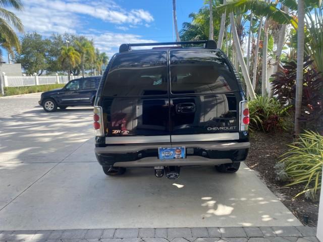 2001 Onyx Black /Graphite/Med Gray Chevrolet Suburban LT Z71 1 FL 4WD 44 SERVICES NO ACCIDENTS (3GNFK16T41G) with an 5.3L Vortec 1000 SFI V8 Engine engine, Automatic transmission, located at 4701 North Dixie Hwy, Pompano Beach, FL, 33064, (954) 422-2889, 26.240938, -80.123474 - OUR WEBPAGE FLORIDACARS1.COM HAS OVER 100 PHOTOS AND FREE CARFAX LINK 2001 CHEVROLET SUBURBAN 1500 Z71 4 WHEEL DRIVE LEATHER LOADED SUNROOF IMMACULATE VIN: 3GNFK16T41G205451 3 G N F K 1 6 T 4 1 G 2 0 5 4 5 1 4 DOOR WAGON/SPORT UTILITY 5.3L V8 F OHV GASOLINE 18 MPG REAR WHEEL DRIVE W/ 4X4 Features 4W - Photo#35