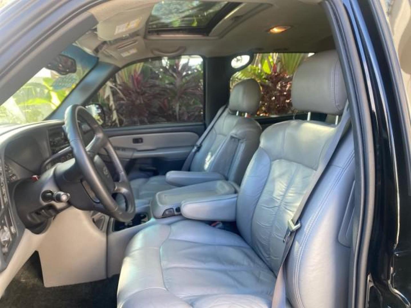 2001 Onyx Black /Graphite/Med Gray Chevrolet Suburban LT Z71 1 FL 4WD 44 SERVICES NO ACCIDENTS (3GNFK16T41G) with an 5.3L Vortec 1000 SFI V8 Engine engine, Automatic transmission, located at 4701 North Dixie Hwy, Pompano Beach, FL, 33064, (954) 422-2889, 26.240938, -80.123474 - OUR WEBPAGE FLORIDACARS1.COM HAS OVER 100 PHOTOS AND FREE CARFAX LINK 2001 CHEVROLET SUBURBAN 1500 Z71 4 WHEEL DRIVE LEATHER LOADED SUNROOF IMMACULATE VIN: 3GNFK16T41G205451 3 G N F K 1 6 T 4 1 G 2 0 5 4 5 1 4 DOOR WAGON/SPORT UTILITY 5.3L V8 F OHV GASOLINE 18 MPG REAR WHEEL DRIVE W/ 4X4 Features 4W - Photo#45