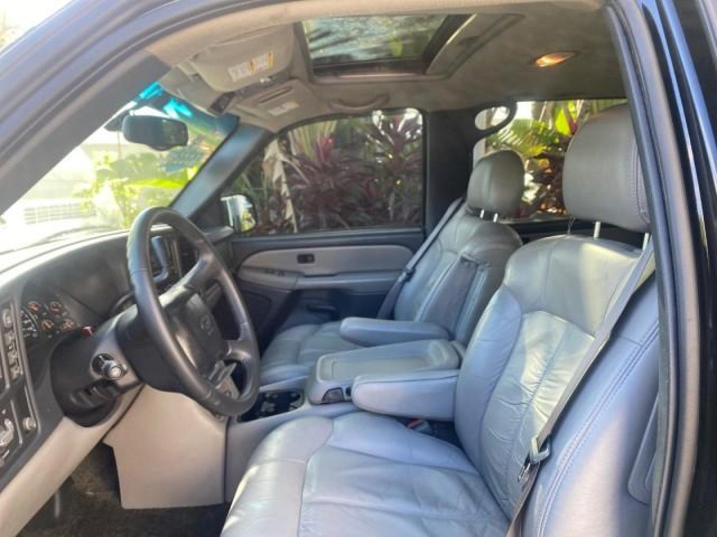 2001 Onyx Black /Graphite/Med Gray Chevrolet Suburban LT Z71 1 FL 4WD 44 SERVICES NO ACCIDENTS (3GNFK16T41G) with an 5.3L Vortec 1000 SFI V8 Engine engine, Automatic transmission, located at 4701 North Dixie Hwy, Pompano Beach, FL, 33064, (954) 422-2889, 26.240938, -80.123474 - OUR WEBPAGE FLORIDACARS1.COM HAS OVER 100 PHOTOS AND FREE CARFAX LINK 2001 CHEVROLET SUBURBAN 1500 Z71 4 WHEEL DRIVE LEATHER LOADED SUNROOF IMMACULATE VIN: 3GNFK16T41G205451 3 G N F K 1 6 T 4 1 G 2 0 5 4 5 1 4 DOOR WAGON/SPORT UTILITY 5.3L V8 F OHV GASOLINE 18 MPG REAR WHEEL DRIVE W/ 4X4 Features 4W - Photo#46