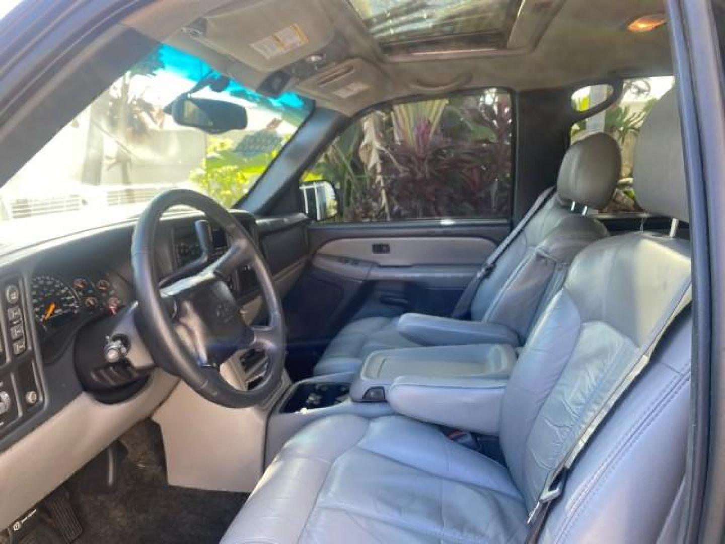 2001 Onyx Black /Graphite/Med Gray Chevrolet Suburban LT Z71 1 FL 4WD 44 SERVICES NO ACCIDENTS (3GNFK16T41G) with an 5.3L Vortec 1000 SFI V8 Engine engine, Automatic transmission, located at 4701 North Dixie Hwy, Pompano Beach, FL, 33064, (954) 422-2889, 26.240938, -80.123474 - OUR WEBPAGE FLORIDACARS1.COM HAS OVER 100 PHOTOS AND FREE CARFAX LINK 2001 CHEVROLET SUBURBAN 1500 Z71 4 WHEEL DRIVE LEATHER LOADED SUNROOF IMMACULATE VIN: 3GNFK16T41G205451 3 G N F K 1 6 T 4 1 G 2 0 5 4 5 1 4 DOOR WAGON/SPORT UTILITY 5.3L V8 F OHV GASOLINE 18 MPG REAR WHEEL DRIVE W/ 4X4 Features 4W - Photo#47