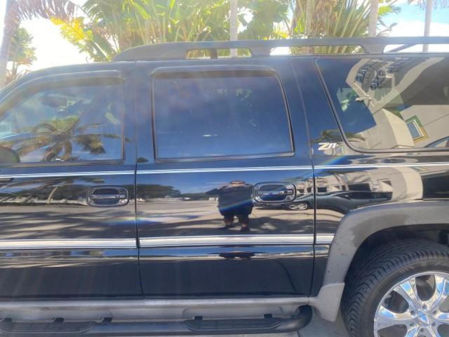 2001 Onyx Black /Graphite/Med Gray Chevrolet Suburban LT Z71 1 FL 4WD 44 SERVICES NO ACCIDENTS (3GNFK16T41G) with an 5.3L Vortec 1000 SFI V8 Engine engine, Automatic transmission, located at 4701 North Dixie Hwy, Pompano Beach, FL, 33064, (954) 422-2889, 26.240938, -80.123474 - OUR WEBPAGE FLORIDACARS1.COM HAS OVER 100 PHOTOS AND FREE CARFAX LINK 2001 CHEVROLET SUBURBAN 1500 Z71 4 WHEEL DRIVE LEATHER LOADED SUNROOF IMMACULATE VIN: 3GNFK16T41G205451 3 G N F K 1 6 T 4 1 G 2 0 5 4 5 1 4 DOOR WAGON/SPORT UTILITY 5.3L V8 F OHV GASOLINE 18 MPG REAR WHEEL DRIVE W/ 4X4 Features 4W - Photo#78