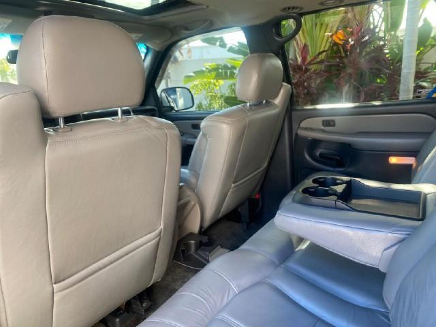 2001 Onyx Black /Graphite/Med Gray Chevrolet Suburban LT Z71 1 FL 4WD 44 SERVICES NO ACCIDENTS (3GNFK16T41G) with an 5.3L Vortec 1000 SFI V8 Engine engine, Automatic transmission, located at 4701 North Dixie Hwy, Pompano Beach, FL, 33064, (954) 422-2889, 26.240938, -80.123474 - OUR WEBPAGE FLORIDACARS1.COM HAS OVER 100 PHOTOS AND FREE CARFAX LINK 2001 CHEVROLET SUBURBAN 1500 Z71 4 WHEEL DRIVE LEATHER LOADED SUNROOF IMMACULATE VIN: 3GNFK16T41G205451 3 G N F K 1 6 T 4 1 G 2 0 5 4 5 1 4 DOOR WAGON/SPORT UTILITY 5.3L V8 F OHV GASOLINE 18 MPG REAR WHEEL DRIVE W/ 4X4 Features 4W - Photo#82