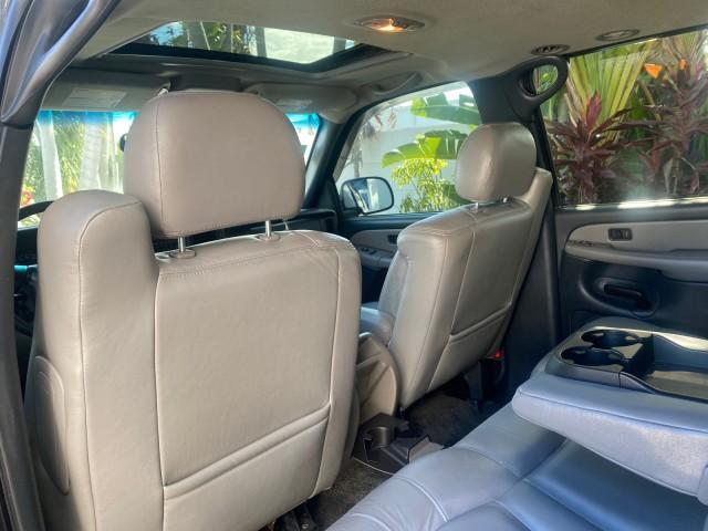 2001 Onyx Black /Graphite/Med Gray Chevrolet Suburban LT Z71 1 FL 4WD 44 SERVICES NO ACCIDENTS (3GNFK16T41G) with an 5.3L Vortec 1000 SFI V8 Engine engine, Automatic transmission, located at 4701 North Dixie Hwy, Pompano Beach, FL, 33064, (954) 422-2889, 26.240938, -80.123474 - OUR WEBPAGE FLORIDACARS1.COM HAS OVER 100 PHOTOS AND FREE CARFAX LINK 2001 CHEVROLET SUBURBAN 1500 Z71 4 WHEEL DRIVE LEATHER LOADED SUNROOF IMMACULATE VIN: 3GNFK16T41G205451 3 G N F K 1 6 T 4 1 G 2 0 5 4 5 1 4 DOOR WAGON/SPORT UTILITY 5.3L V8 F OHV GASOLINE 18 MPG REAR WHEEL DRIVE W/ 4X4 Features 4W - Photo#83