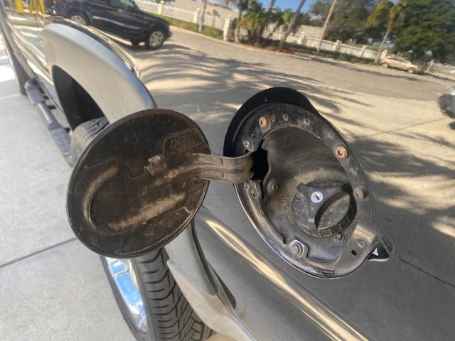 2001 Onyx Black /Graphite/Med Gray Chevrolet Suburban LT Z71 1 FL 4WD 44 SERVICES NO ACCIDENTS (3GNFK16T41G) with an 5.3L Vortec 1000 SFI V8 Engine engine, Automatic transmission, located at 4701 North Dixie Hwy, Pompano Beach, FL, 33064, (954) 422-2889, 26.240938, -80.123474 - OUR WEBPAGE FLORIDACARS1.COM HAS OVER 100 PHOTOS AND FREE CARFAX LINK 2001 CHEVROLET SUBURBAN 1500 Z71 4 WHEEL DRIVE LEATHER LOADED SUNROOF IMMACULATE VIN: 3GNFK16T41G205451 3 G N F K 1 6 T 4 1 G 2 0 5 4 5 1 4 DOOR WAGON/SPORT UTILITY 5.3L V8 F OHV GASOLINE 18 MPG REAR WHEEL DRIVE W/ 4X4 Features 4W - Photo#98