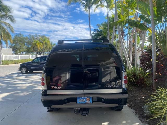 2001 Onyx Black /Graphite/Med Gray Chevrolet Suburban LT Z71 1 FL 4WD 44 SERVICES NO ACCIDENTS (3GNFK16T41G) with an 5.3L Vortec 1000 SFI V8 Engine engine, Automatic transmission, located at 4701 North Dixie Hwy, Pompano Beach, FL, 33064, (954) 422-2889, 26.240938, -80.123474 - OUR WEBPAGE FLORIDACARS1.COM HAS OVER 100 PHOTOS AND FREE CARFAX LINK 2001 CHEVROLET SUBURBAN 1500 Z71 4 WHEEL DRIVE LEATHER LOADED SUNROOF IMMACULATE VIN: 3GNFK16T41G205451 3 G N F K 1 6 T 4 1 G 2 0 5 4 5 1 4 DOOR WAGON/SPORT UTILITY 5.3L V8 F OHV GASOLINE 18 MPG REAR WHEEL DRIVE W/ 4X4 Features 4W - Photo#99