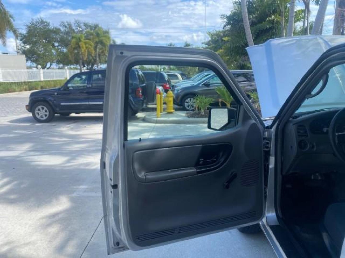 2008 Silver Metallic /Medium Dark Flint Ebony Ford Ranger XL LOW MILES 49,420 (1FTYR10D28P) with an 2.3L DOHC 16-Valve I4 Engine engine, Automatic transmission, located at 4701 North Dixie Hwy, Pompano Beach, FL, 33064, (954) 422-2889, 26.240938, -80.123474 - OUR WEBPAGE FLORIDACARS1.COM HAS OVER 100 PHOTOS AND FREE CARFAX LINK 2008 FORD RANGER XL AUTO AC 4 CYLN CAMPER TOP LOW MILES VIN: 1FTYR10D28PA70636 1 F T Y R 1 0 D 2 8 P A 7 0 6 3 6 PICKUP 2.3L 4 F GASOLINE 26 MPG REAR WHEEL DRIVE Features ABS Brakes Air Conditioning AM/FM Stereo Automatic Transmis - Photo#9