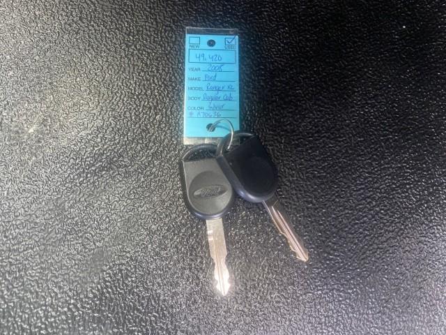 2008 Silver Metallic /Medium Dark Flint Ebony Ford Ranger XL LOW MILES 49,420 (1FTYR10D28P) with an 2.3L DOHC 16-Valve I4 Engine engine, Automatic transmission, located at 4701 North Dixie Hwy, Pompano Beach, FL, 33064, (954) 422-2889, 26.240938, -80.123474 - OUR WEBPAGE FLORIDACARS1.COM HAS OVER 100 PHOTOS AND FREE CARFAX LINK 2008 FORD RANGER XL AUTO AC 4 CYLN CAMPER TOP LOW MILES VIN: 1FTYR10D28PA70636 1 F T Y R 1 0 D 2 8 P A 7 0 6 3 6 PICKUP 2.3L 4 F GASOLINE 26 MPG REAR WHEEL DRIVE Features ABS Brakes Air Conditioning AM/FM Stereo Automatic Transmis - Photo#23