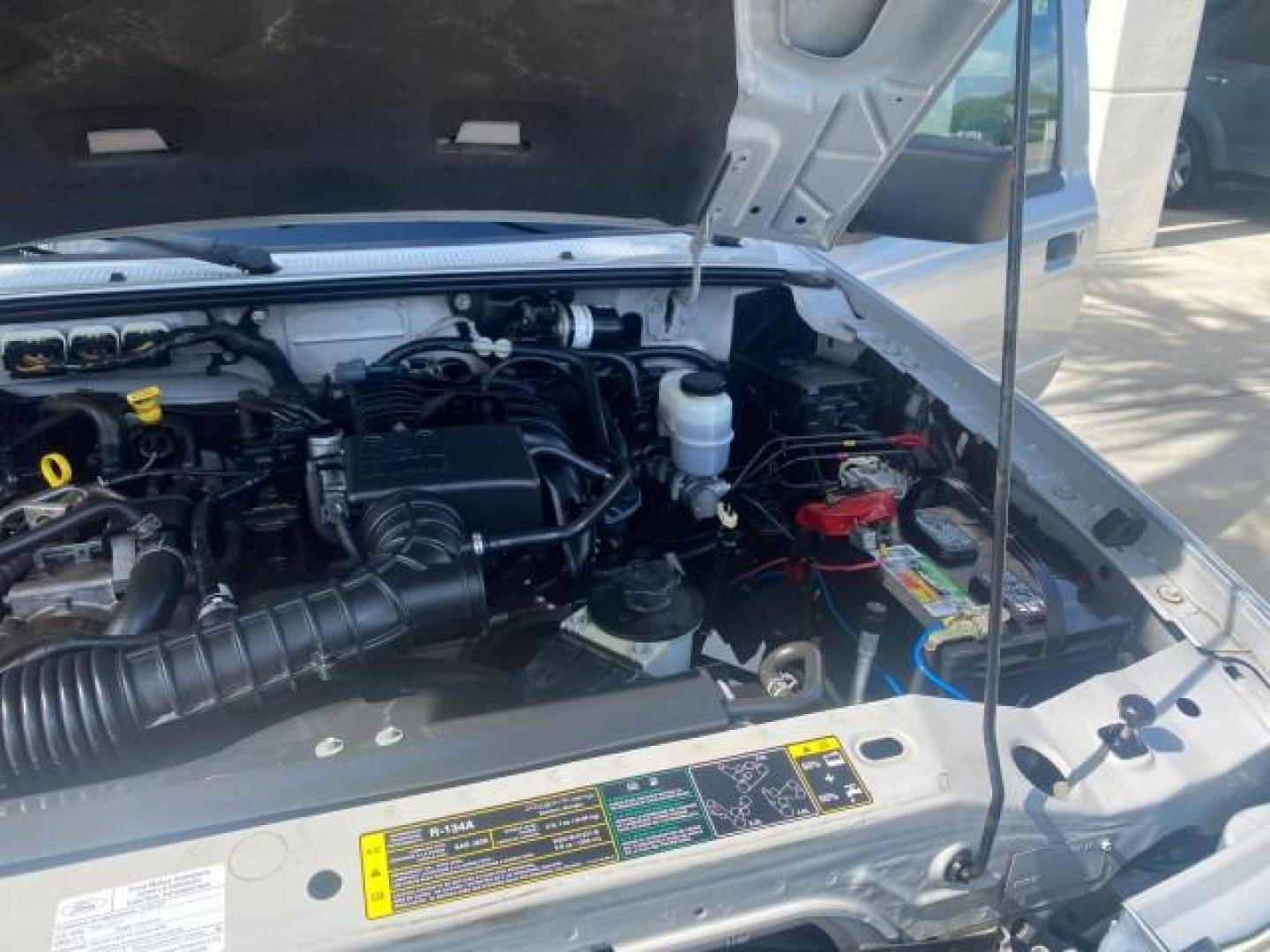 2008 Silver Metallic /Medium Dark Flint Ebony Ford Ranger XL LOW MILES 49,420 (1FTYR10D28P) with an 2.3L DOHC 16-Valve I4 Engine engine, Automatic transmission, located at 4701 North Dixie Hwy, Pompano Beach, FL, 33064, (954) 422-2889, 26.240938, -80.123474 - OUR WEBPAGE FLORIDACARS1.COM HAS OVER 100 PHOTOS AND FREE CARFAX LINK 2008 FORD RANGER XL AUTO AC 4 CYLN CAMPER TOP LOW MILES VIN: 1FTYR10D28PA70636 1 F T Y R 1 0 D 2 8 P A 7 0 6 3 6 PICKUP 2.3L 4 F GASOLINE 26 MPG REAR WHEEL DRIVE Features ABS Brakes Air Conditioning AM/FM Stereo Automatic Transmis - Photo#26