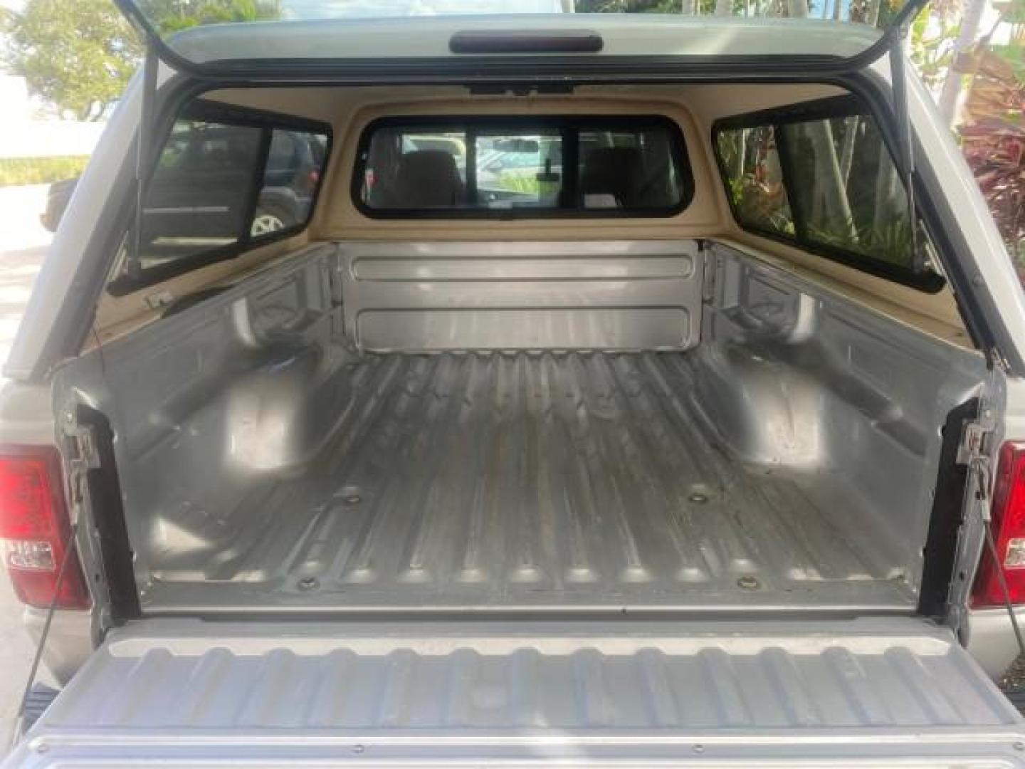 2008 Silver Metallic /Medium Dark Flint Ebony Ford Ranger XL LOW MILES 49,420 (1FTYR10D28P) with an 2.3L DOHC 16-Valve I4 Engine engine, Automatic transmission, located at 4701 North Dixie Hwy, Pompano Beach, FL, 33064, (954) 422-2889, 26.240938, -80.123474 - OUR WEBPAGE FLORIDACARS1.COM HAS OVER 100 PHOTOS AND FREE CARFAX LINK 2008 FORD RANGER XL AUTO AC 4 CYLN CAMPER TOP LOW MILES VIN: 1FTYR10D28PA70636 1 F T Y R 1 0 D 2 8 P A 7 0 6 3 6 PICKUP 2.3L 4 F GASOLINE 26 MPG REAR WHEEL DRIVE Features ABS Brakes Air Conditioning AM/FM Stereo Automatic Transmis - Photo#82