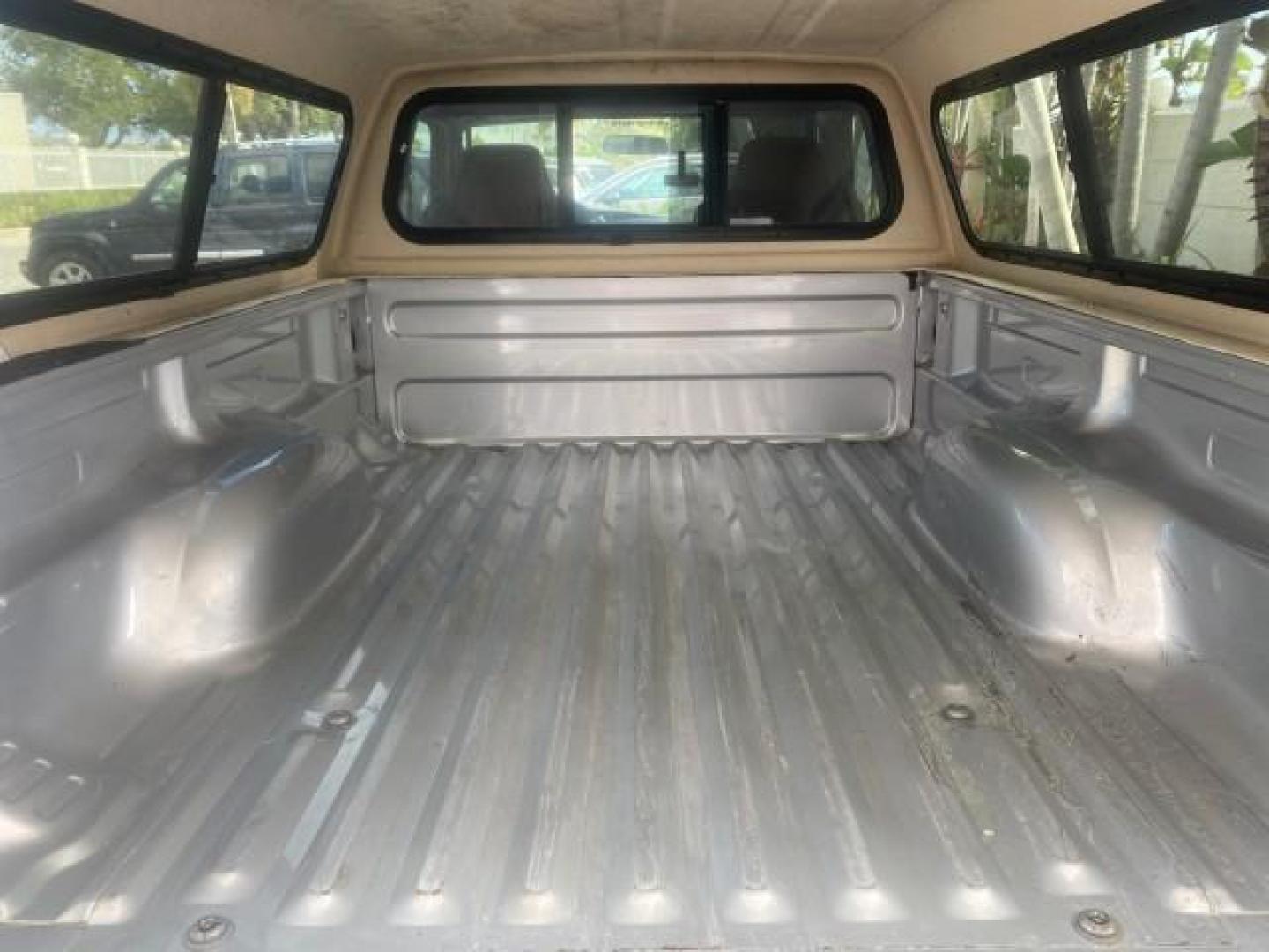 2008 Silver Metallic /Medium Dark Flint Ebony Ford Ranger XL LOW MILES 49,420 (1FTYR10D28P) with an 2.3L DOHC 16-Valve I4 Engine engine, Automatic transmission, located at 4701 North Dixie Hwy, Pompano Beach, FL, 33064, (954) 422-2889, 26.240938, -80.123474 - OUR WEBPAGE FLORIDACARS1.COM HAS OVER 100 PHOTOS AND FREE CARFAX LINK 2008 FORD RANGER XL AUTO AC 4 CYLN CAMPER TOP LOW MILES VIN: 1FTYR10D28PA70636 1 F T Y R 1 0 D 2 8 P A 7 0 6 3 6 PICKUP 2.3L 4 F GASOLINE 26 MPG REAR WHEEL DRIVE Features ABS Brakes Air Conditioning AM/FM Stereo Automatic Transmis - Photo#83