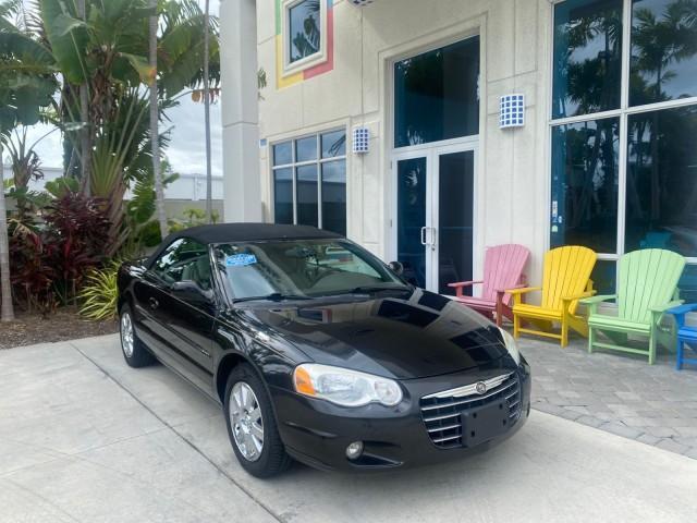 2004 Brilliant Black Crystal Prl /Dark Slate Gray Chrysler Sebring Limited LOW MILES 66,139 (1C3EL65R84N) with an 2.7L MPI DOHC 24-Valve V6 Engine engine, Automatic transmission, located at 4701 North Dixie Hwy, Pompano Beach, FL, 33064, (954) 422-2889, 26.240938, -80.123474 - OUR WEBPAGE FLORIDACARS1.COM HAS OVER 100 PHOTOS AND FREE CARFAX LINK 2004 CHRYSLER SEBRING LIMITED VIN: 1C3EL65R84N154413 1 C 3 E L 6 5 R 8 4 N 1 5 4 4 1 3 CONVERTIBLE 2.7L V6 F DOHC GASOLINE 28 MPG FRONT WHEEL DRIVE Features ABS Brakes Air Conditioning Alloy Wheels AM/FM Stereo Automatic Transmiss - Photo#1
